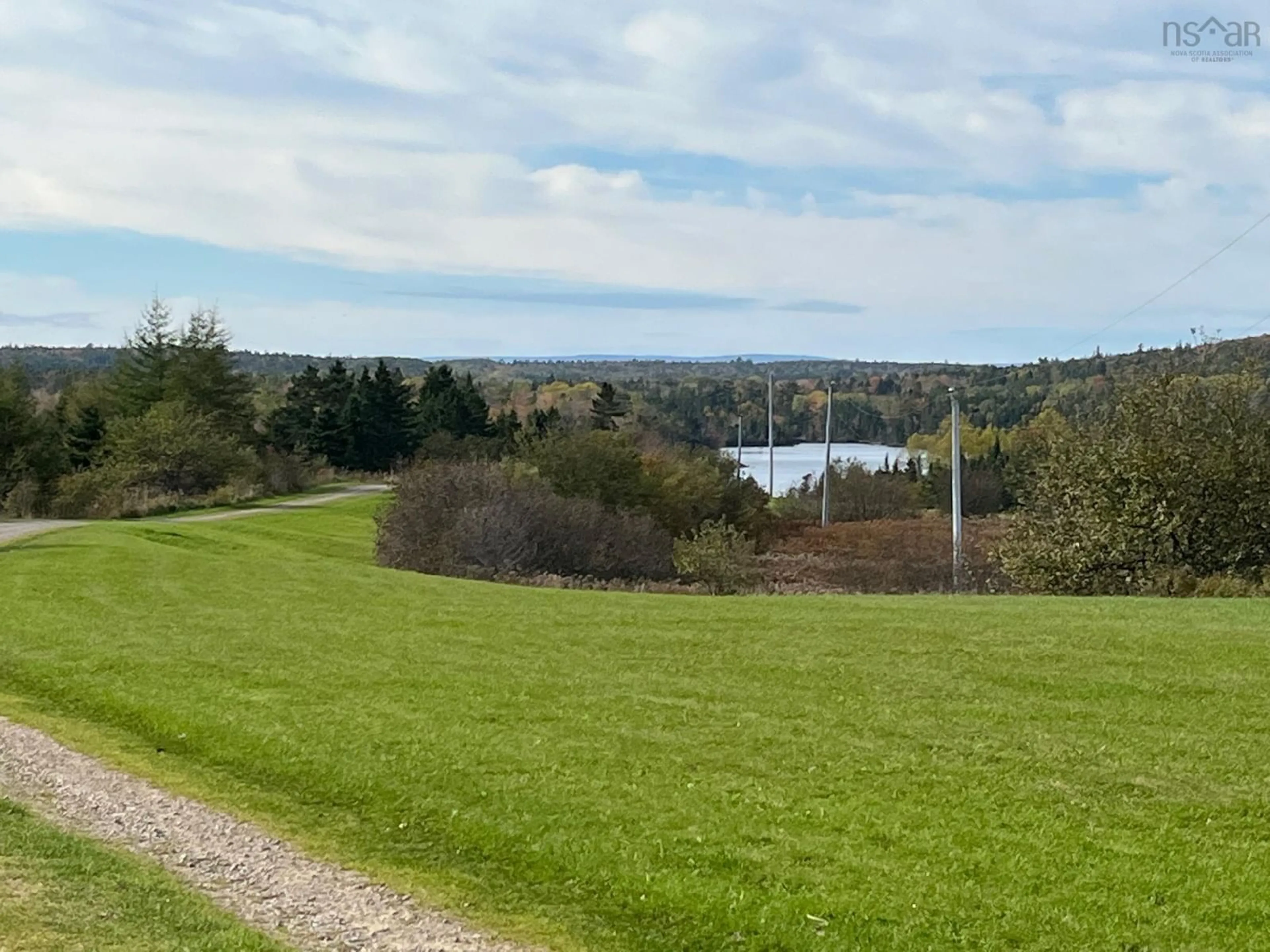 A pic from outside/outdoor area/front of a property/back of a property/a pic from drone, water/lake/river/ocean view for 1223 Highway 223, Estmere Nova Scotia B0E 1T0