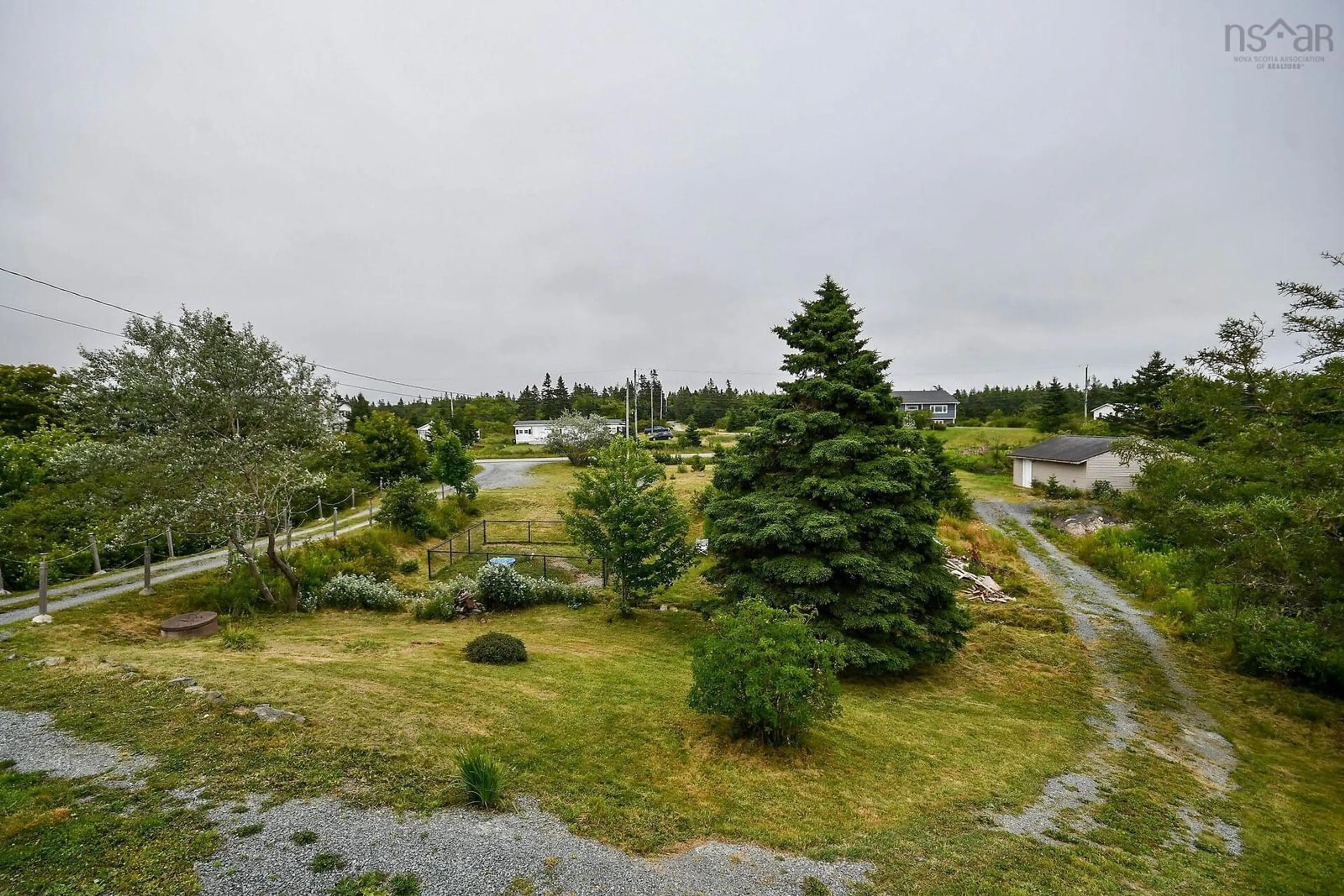 Patio, the fenced backyard for 1424/1442 East Chezzetcook Rd, Lower East Chezzetcook Nova Scotia B0J 2L0