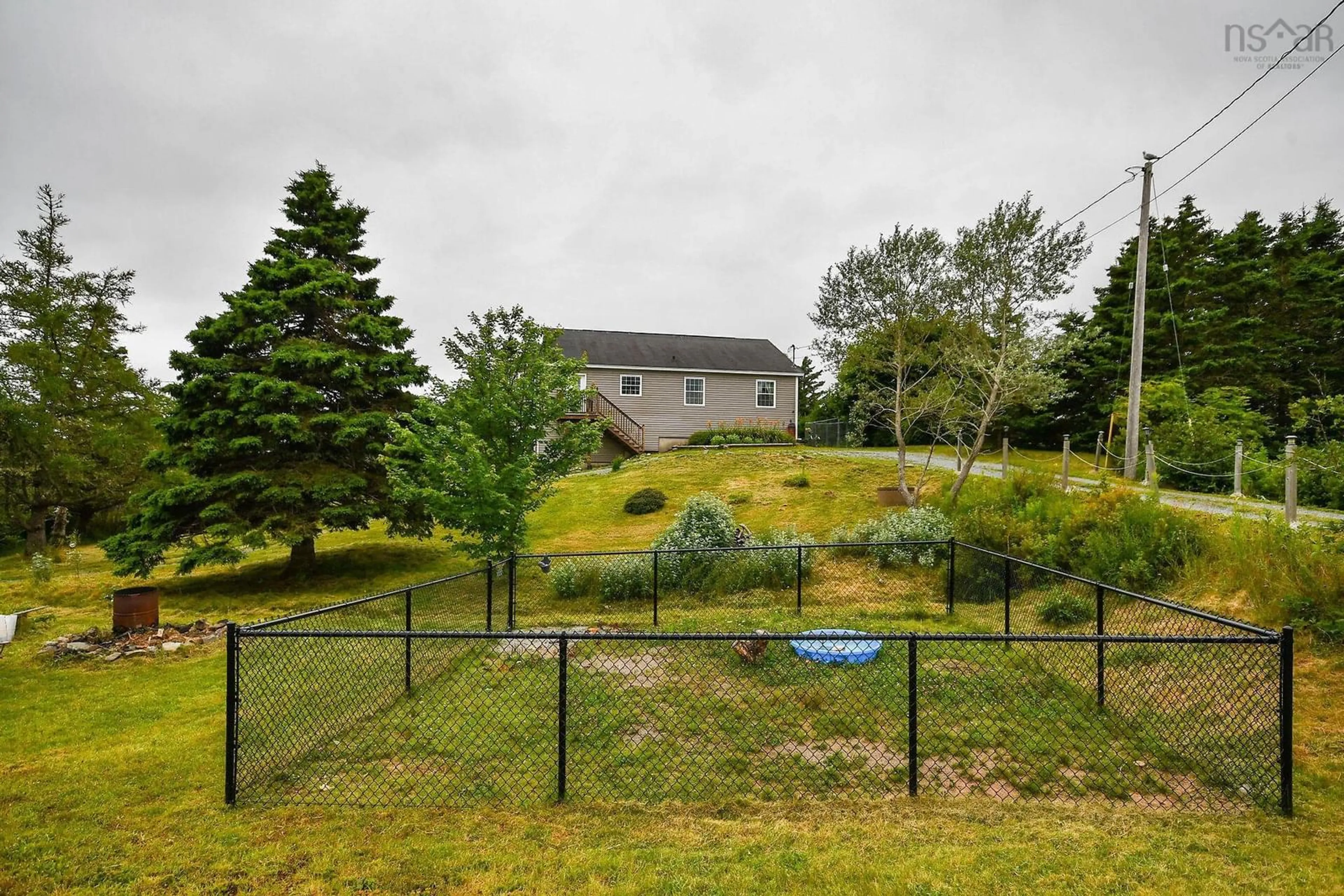 Patio, the fenced backyard for 1424/1442 East Chezzetcook Rd, Lower East Chezzetcook Nova Scotia B0J 2L0