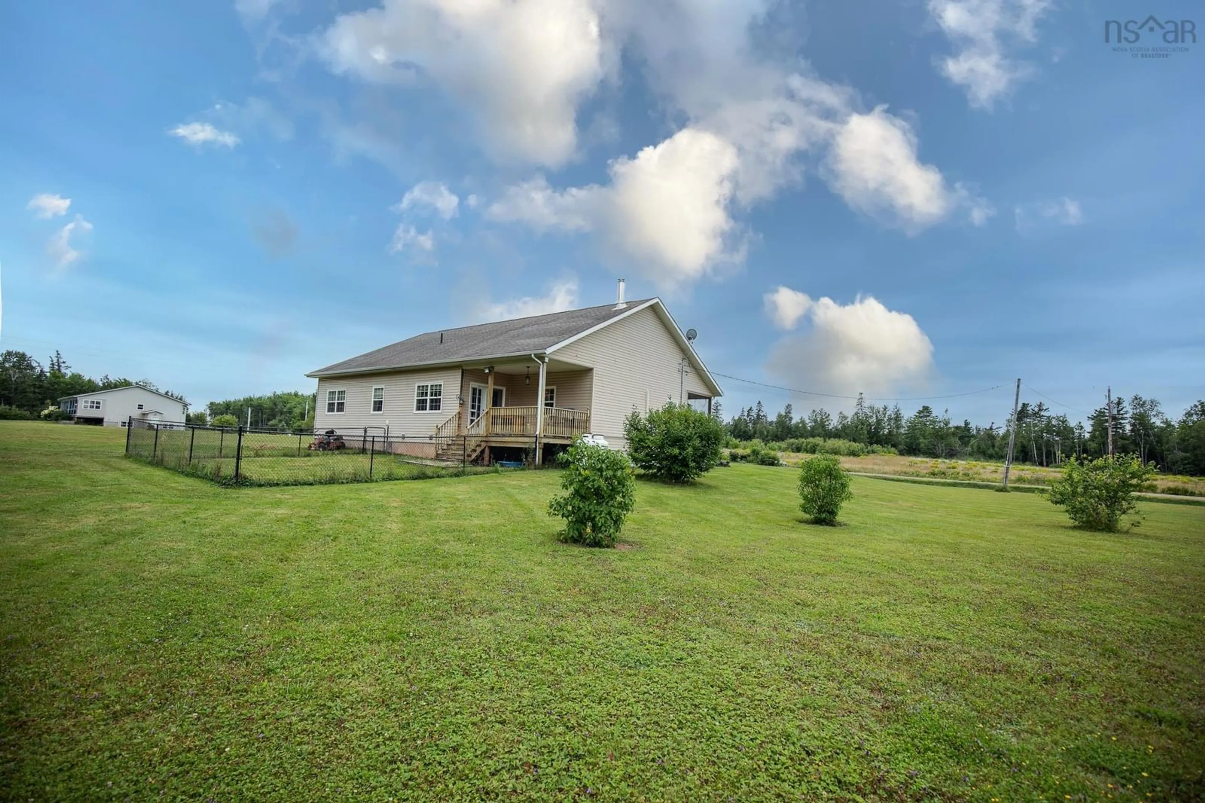 A pic from exterior of the house or condo, the fenced backyard for 180 Robinson Rd, Amherst Head Nova Scotia B4H 3Y2