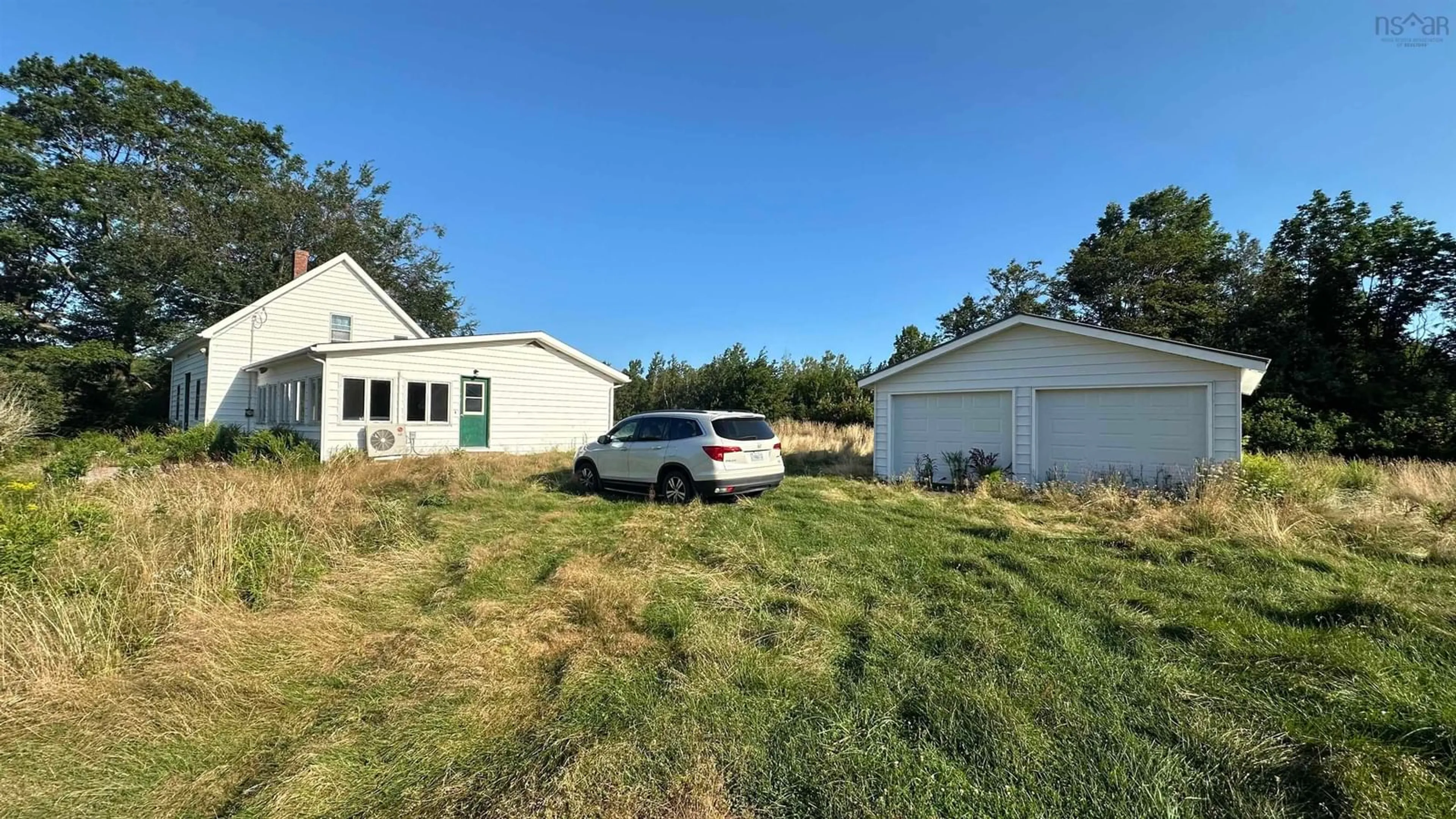 A pic from exterior of the house or condo, the fenced backyard for 7035 Pictou Landing Rd, Chance Harbour Nova Scotia B0K 1X0