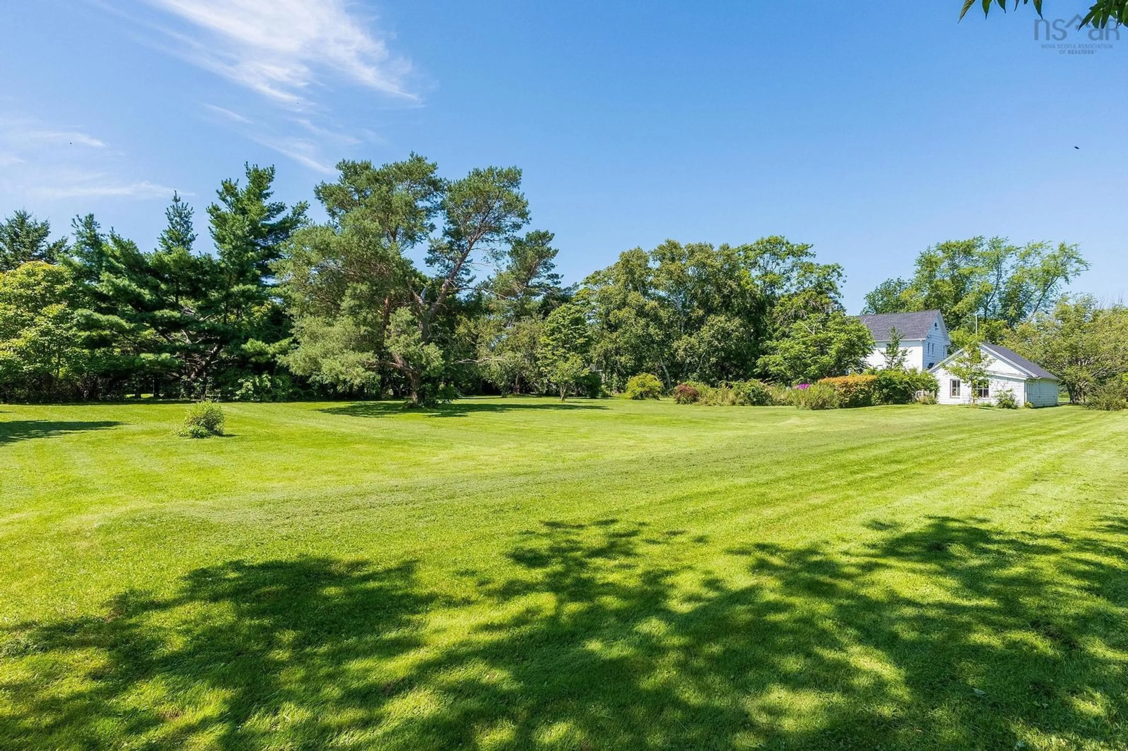 A pic from exterior of the house or condo, the fenced backyard for 514 Granville St, Bridgetown Nova Scotia B0S 1C0