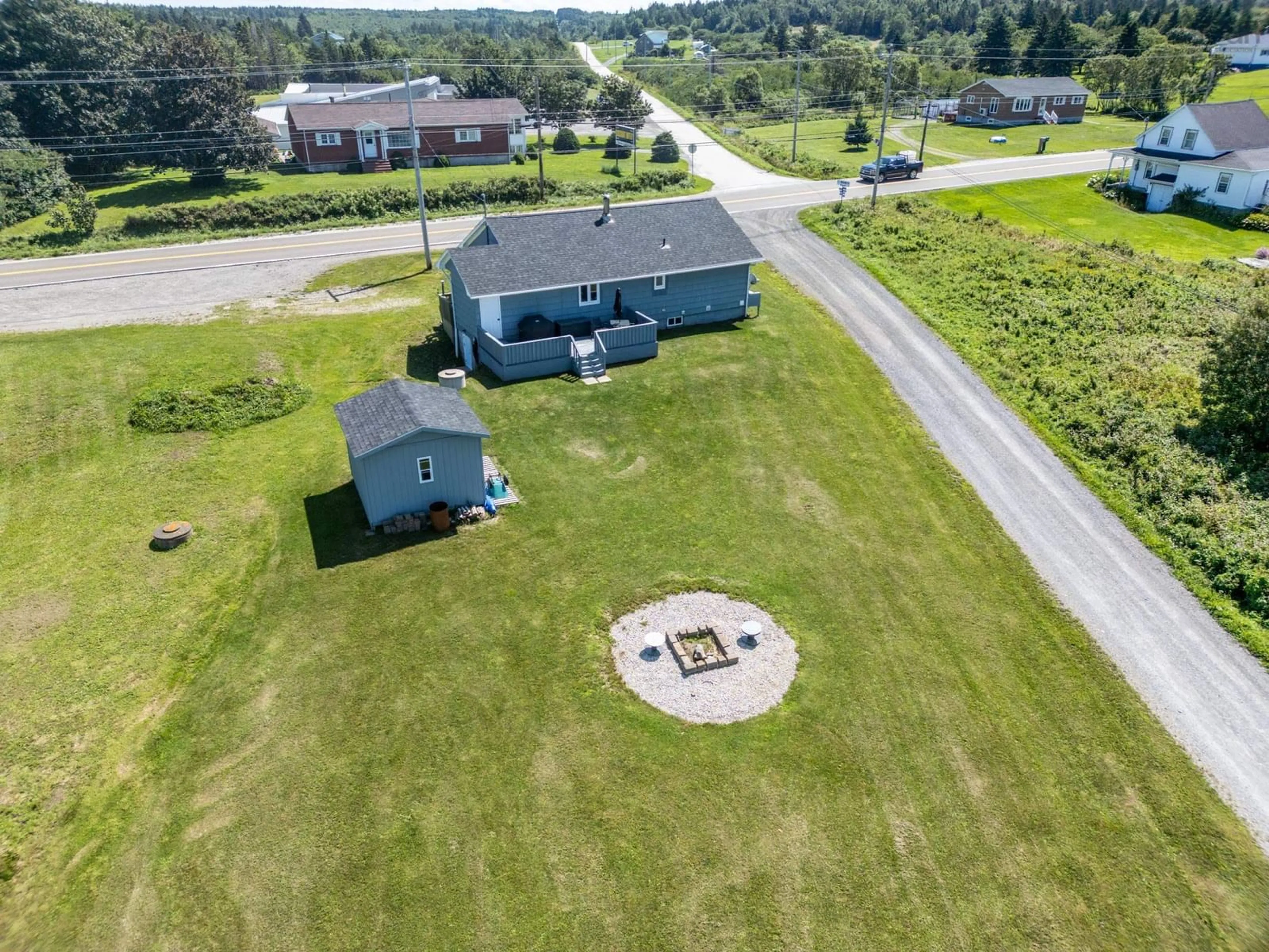 A pic from outside/outdoor area/front of a property/back of a property/a pic from drone, water/lake/river/ocean view for 2523 Highway 1, Grosses Coques Nova Scotia B0W 1M0