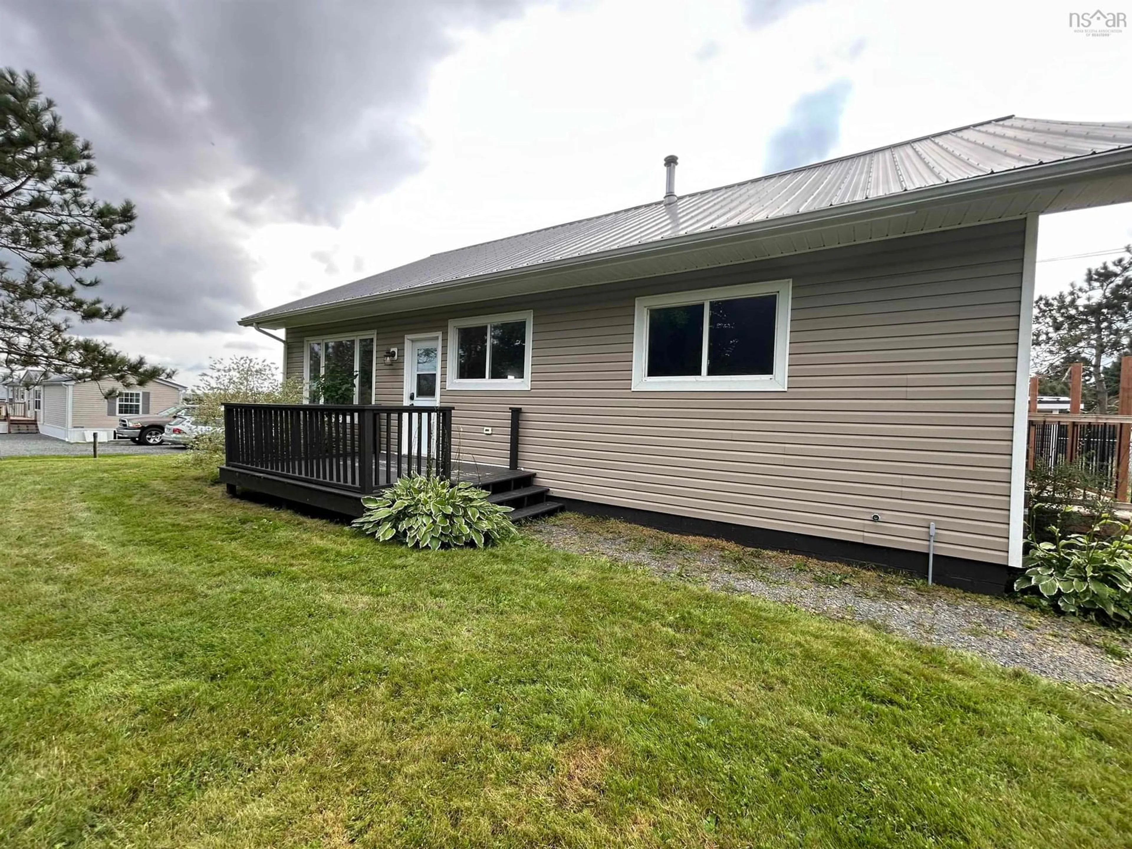 A pic from exterior of the house or condo, the fenced backyard for 45 Putnam Rd, Masstown Nova Scotia B0M 1G0