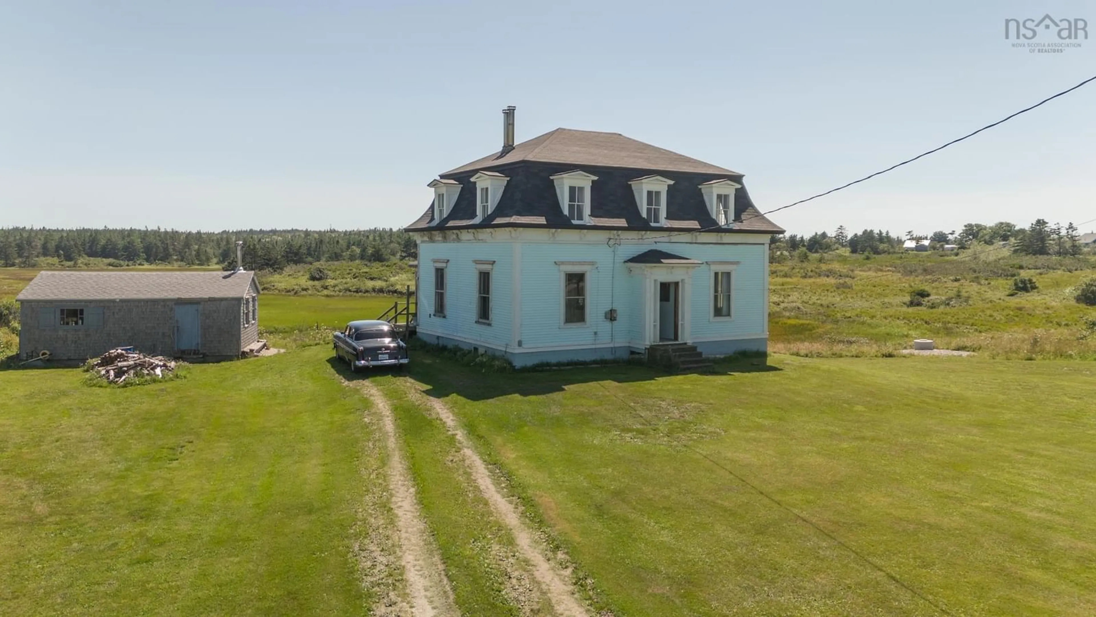 Frontside or backside of a home, the street view for 3258 Main Shore Rd, Port Maitland Nova Scotia B5A 5E2