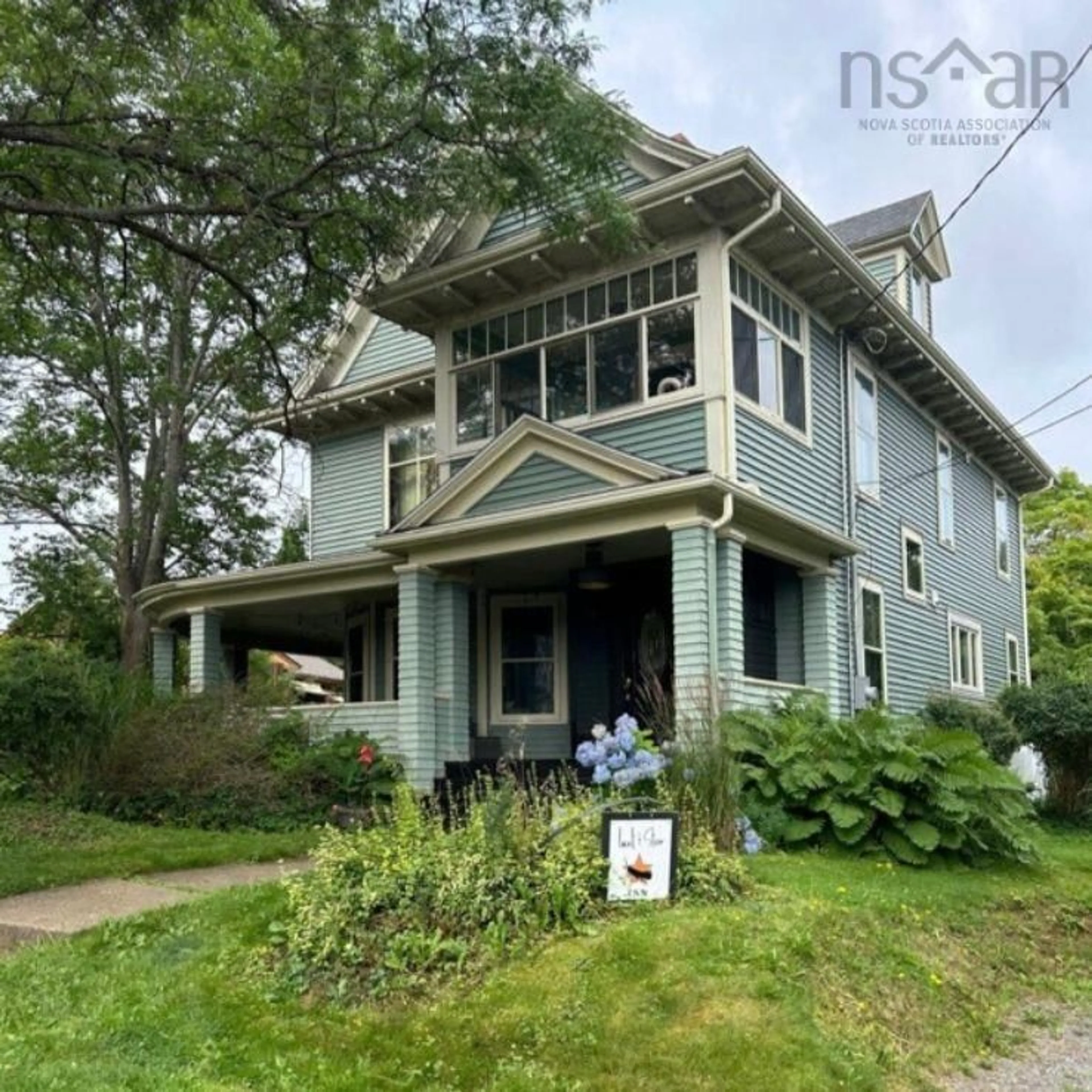 Frontside or backside of a home, cottage for 14 Locust Ave, Wolfville Nova Scotia B4P 2E8