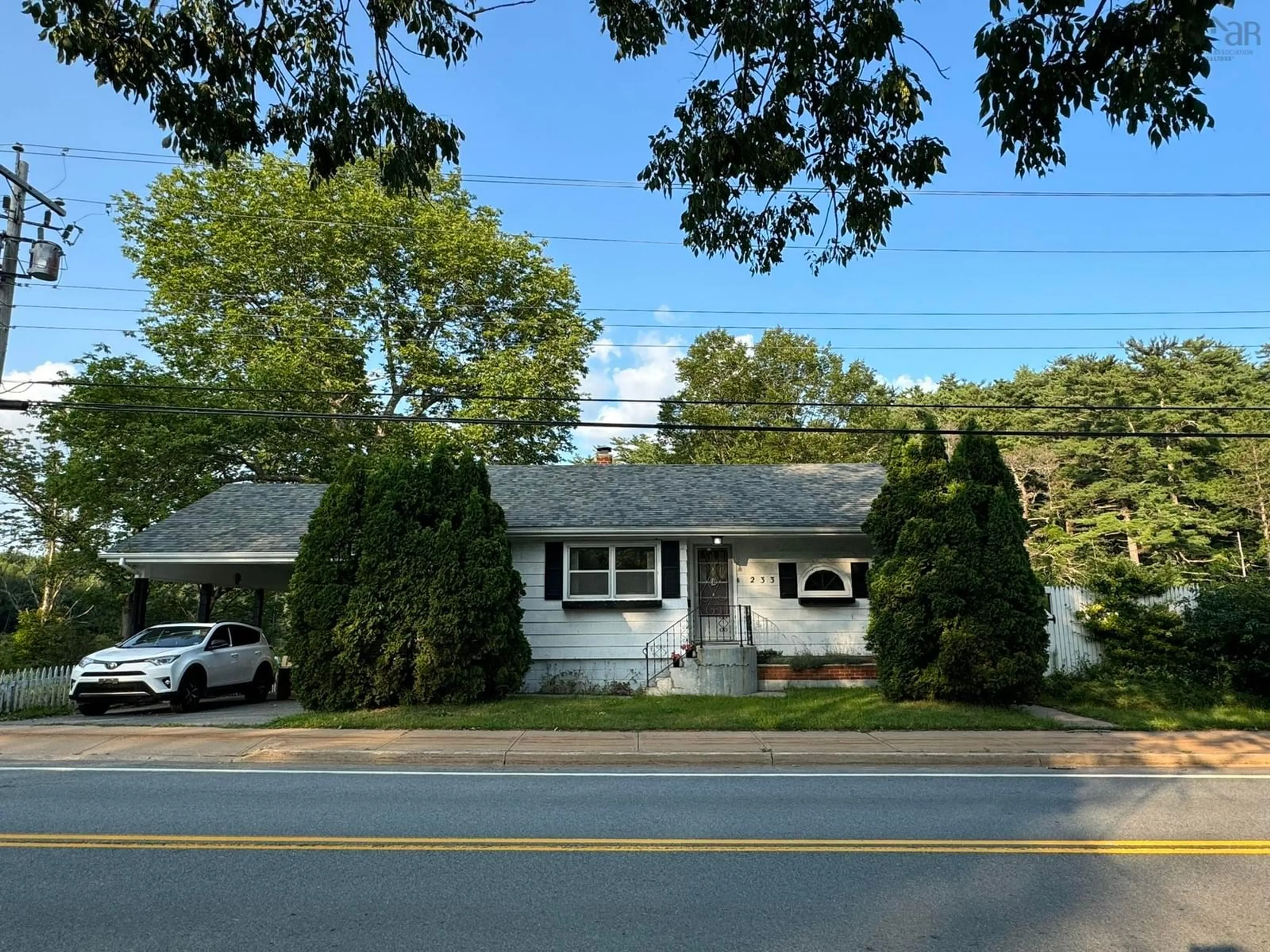 Frontside or backside of a home, the street view for 233 Highway 8, Milton Nova Scotia B0T 1P0