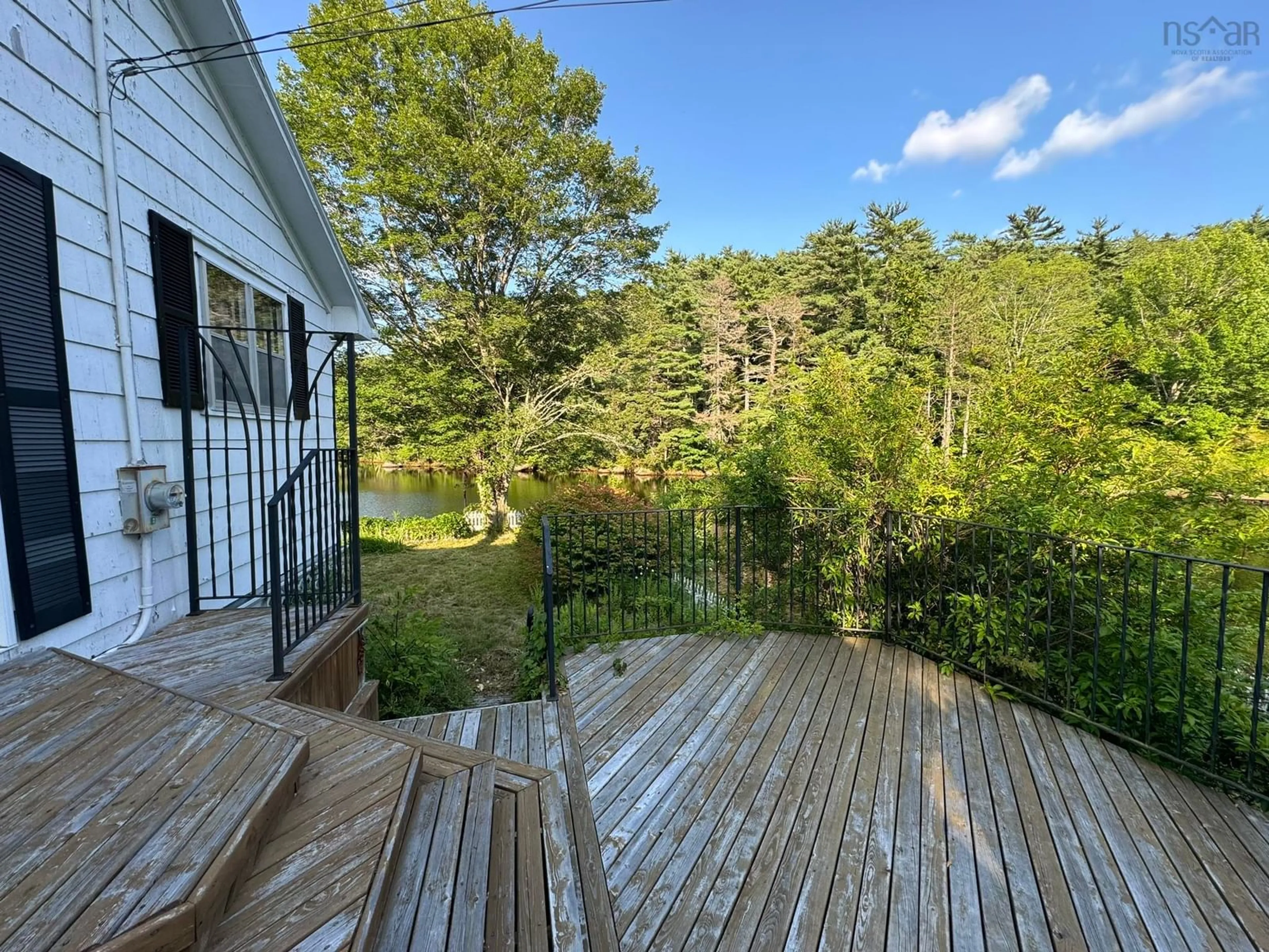 Patio, the fenced backyard for 233 Highway 8, Milton Nova Scotia B0T 1P0