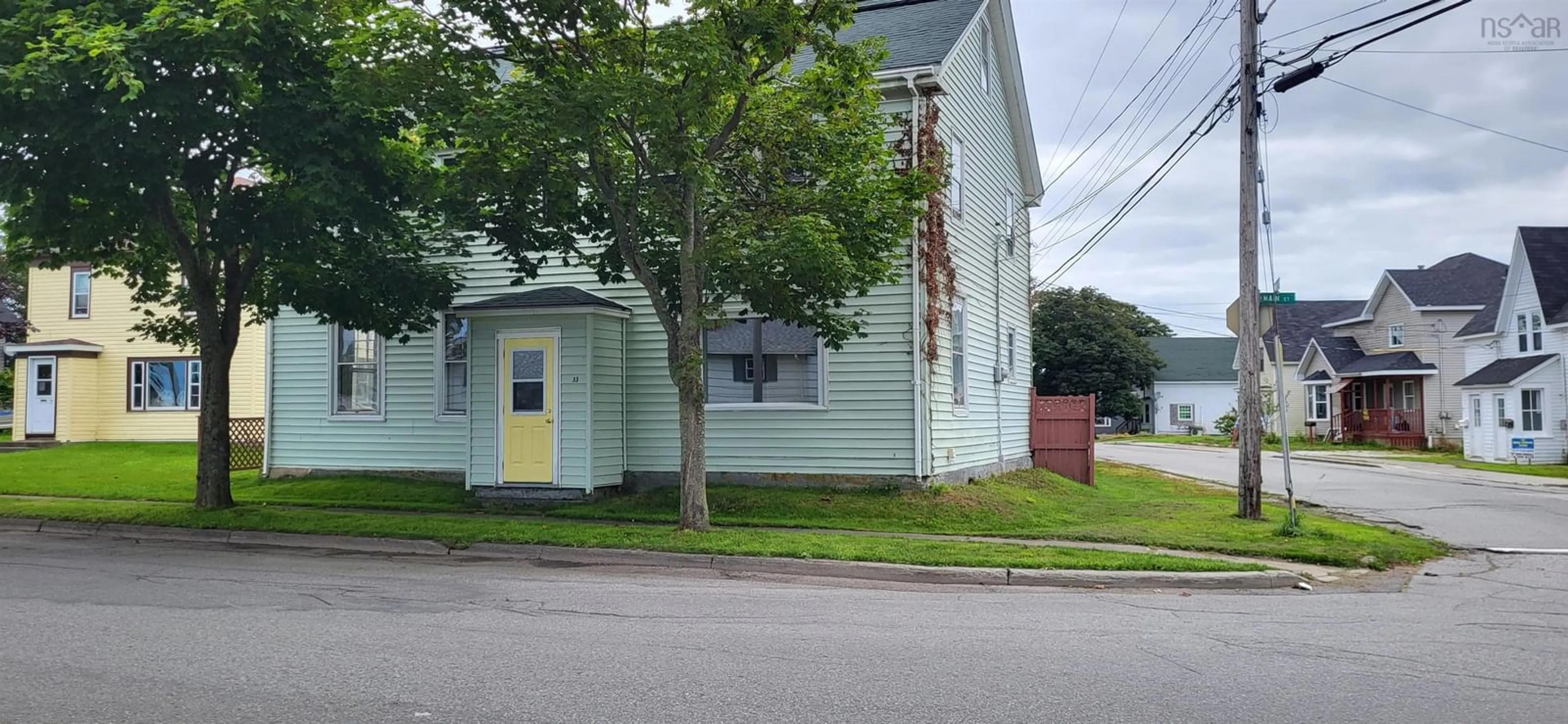 Frontside or backside of a home, the street view for 33 Main St, Yarmouth Nova Scotia B5A 1A3