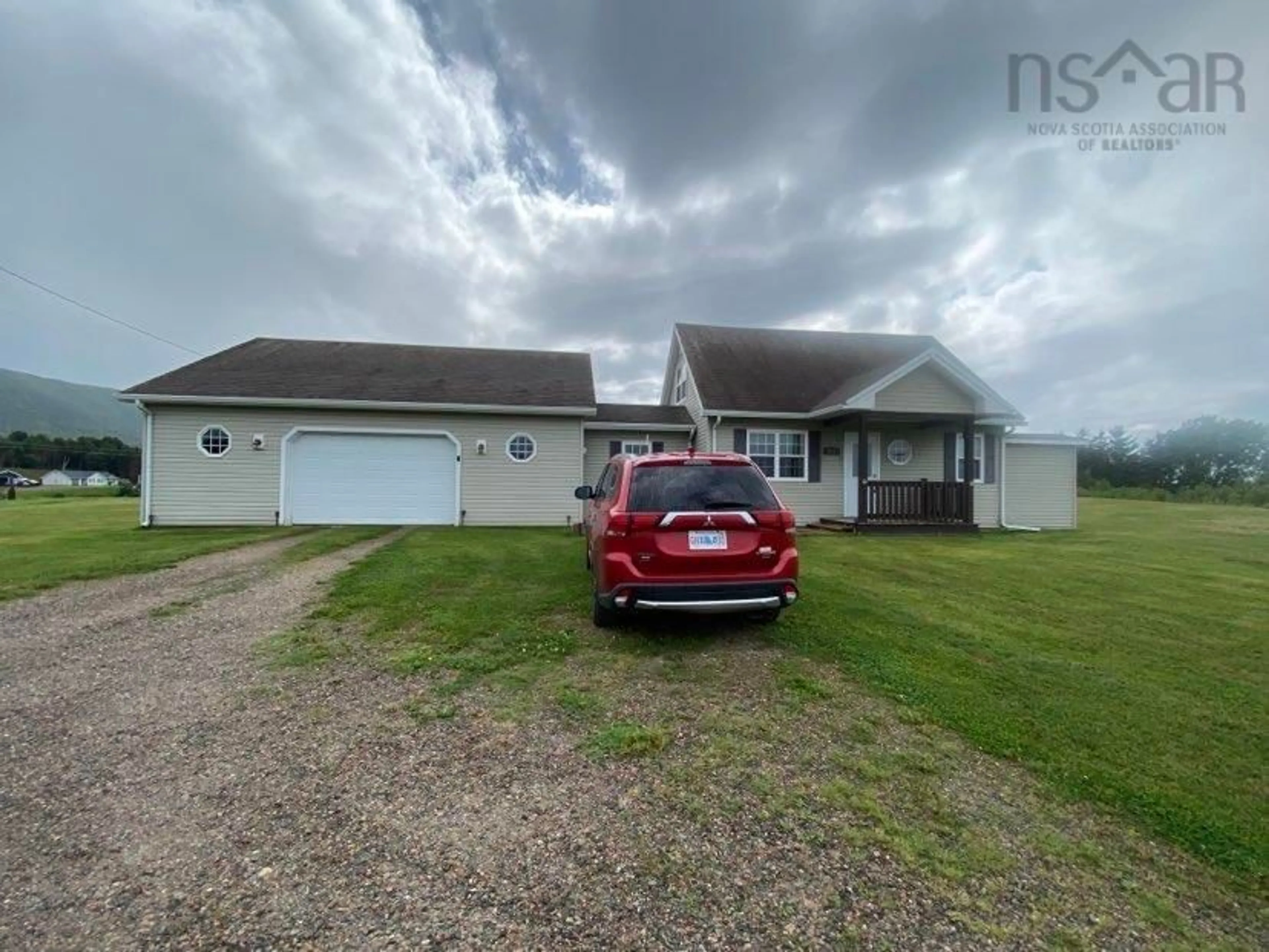 Frontside or backside of a home, the street view for 892 Cheticamp Back Rd, Belle Marche Nova Scotia B0E 1H0