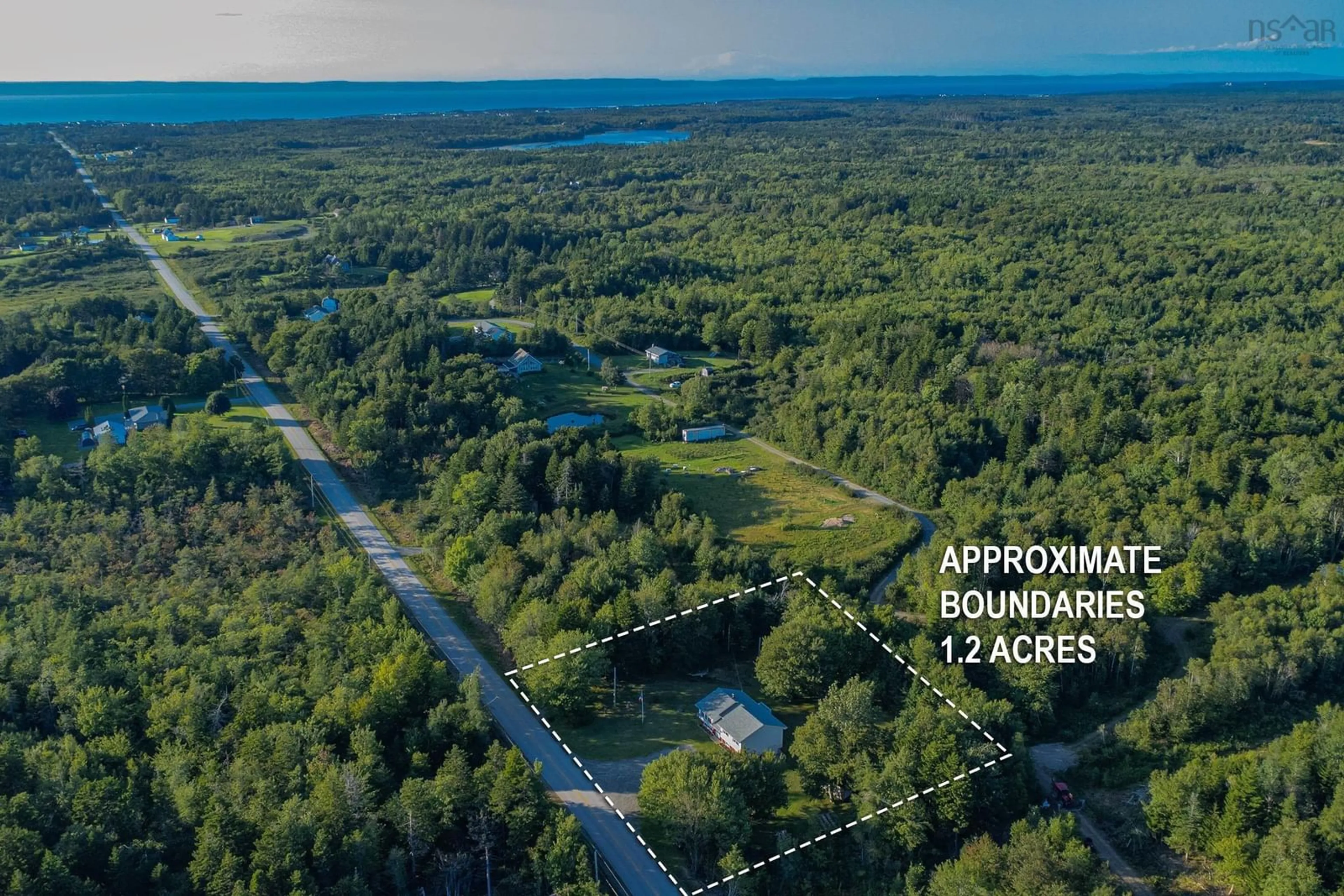 A pic from exterior of the house or condo, the fenced backyard for 867 Patrice Rd, Church Point Nova Scotia B0W 1M0