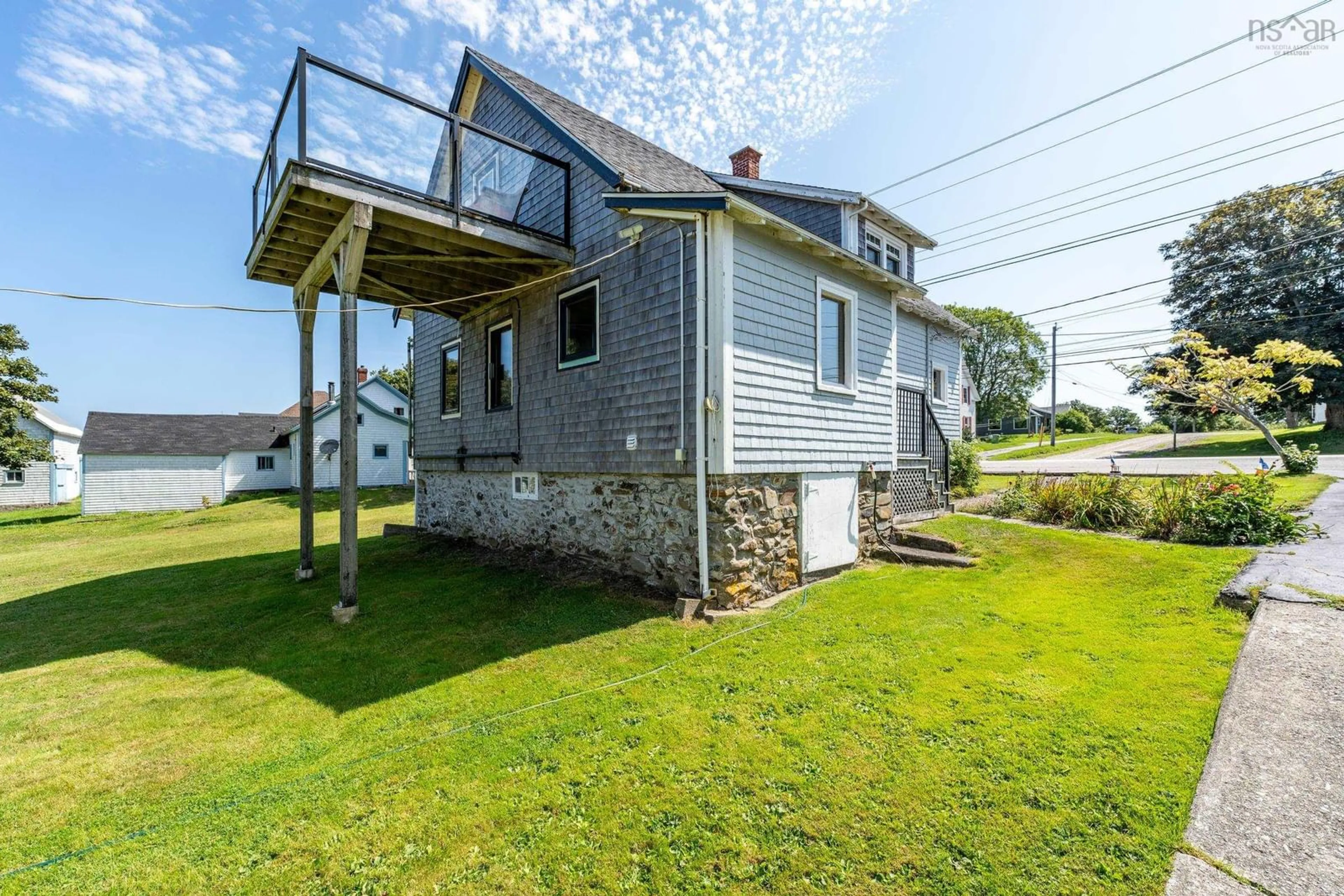 A pic from outside/outdoor area/front of a property/back of a property/a pic from drone, building for 8157 Highway 1, Meteghan Nova Scotia B0W 2J0