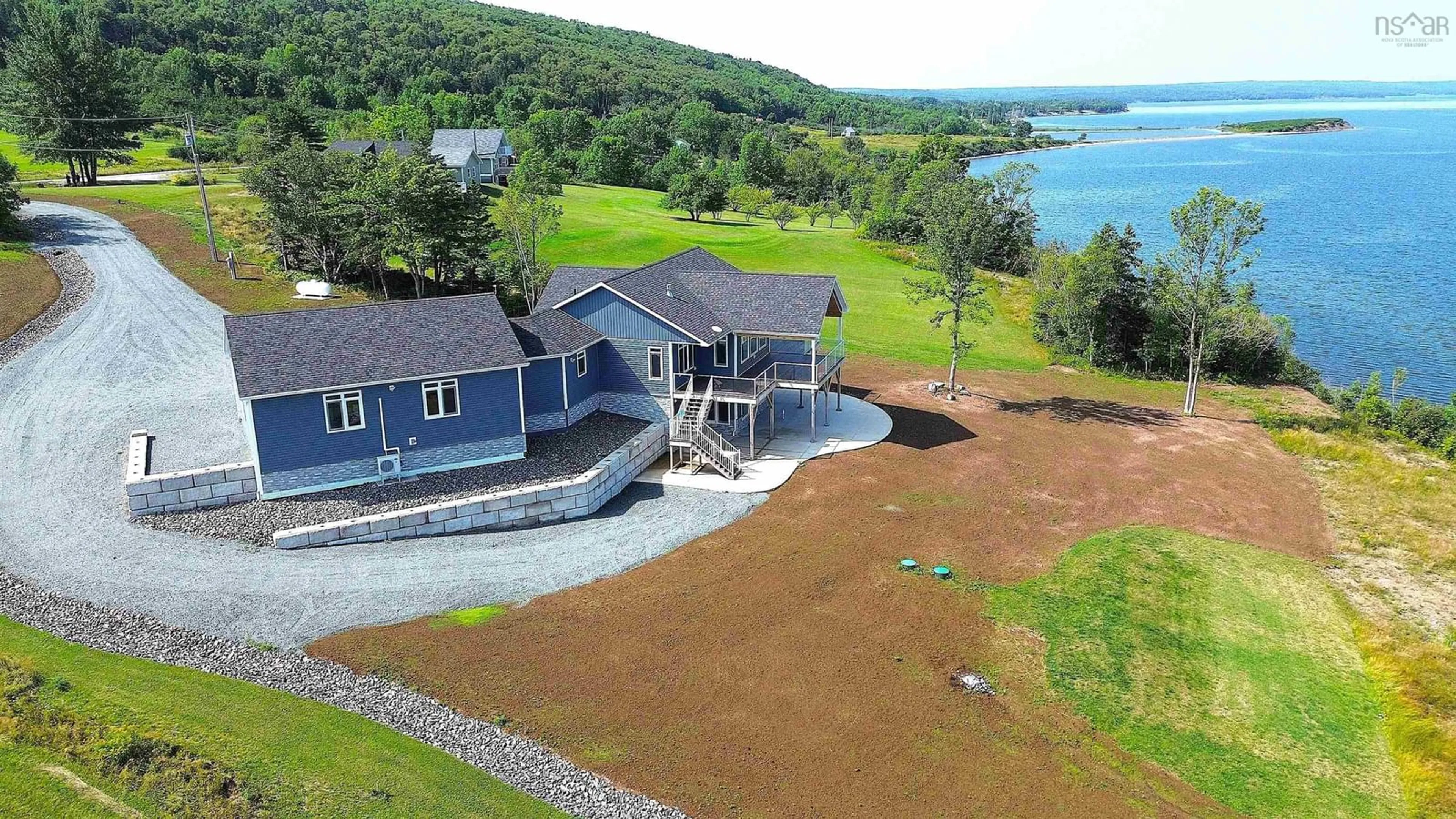 A pic from exterior of the house or condo, cottage for 3361 West Bay Rd., St. Georges Channel, West Bay Nova Scotia B0E 3K0