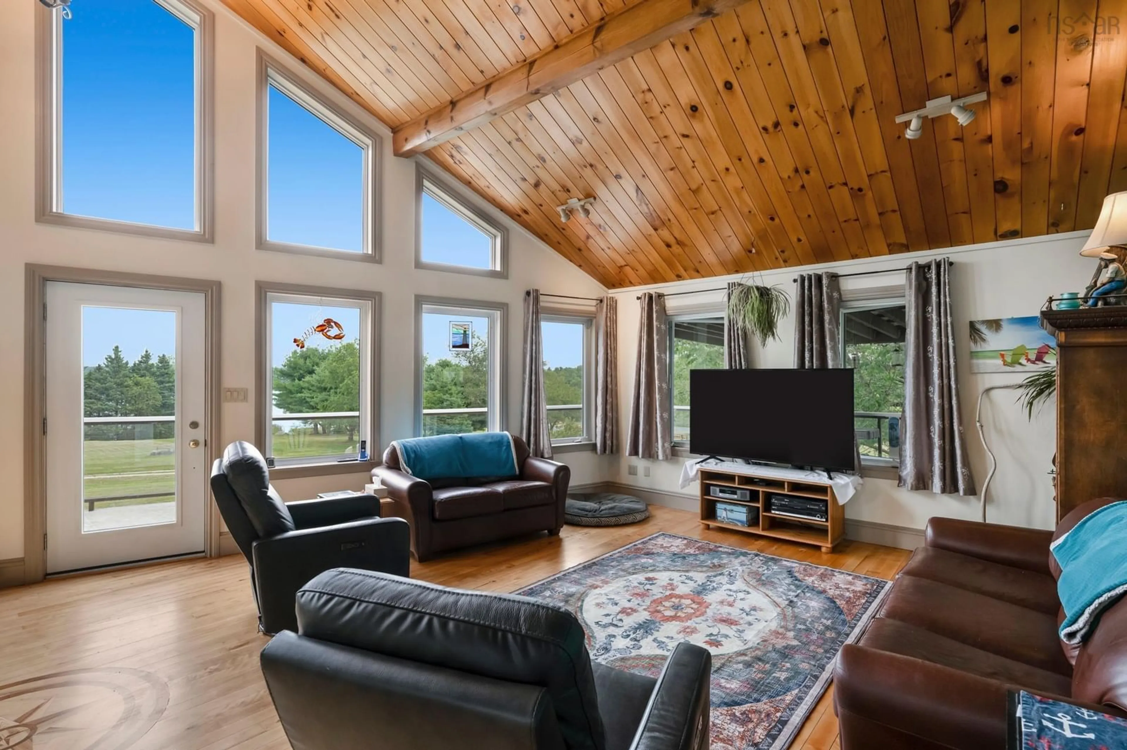 Living room, wood floors for 90 Orchard Hts, Maders Cove Nova Scotia B0J 2E0