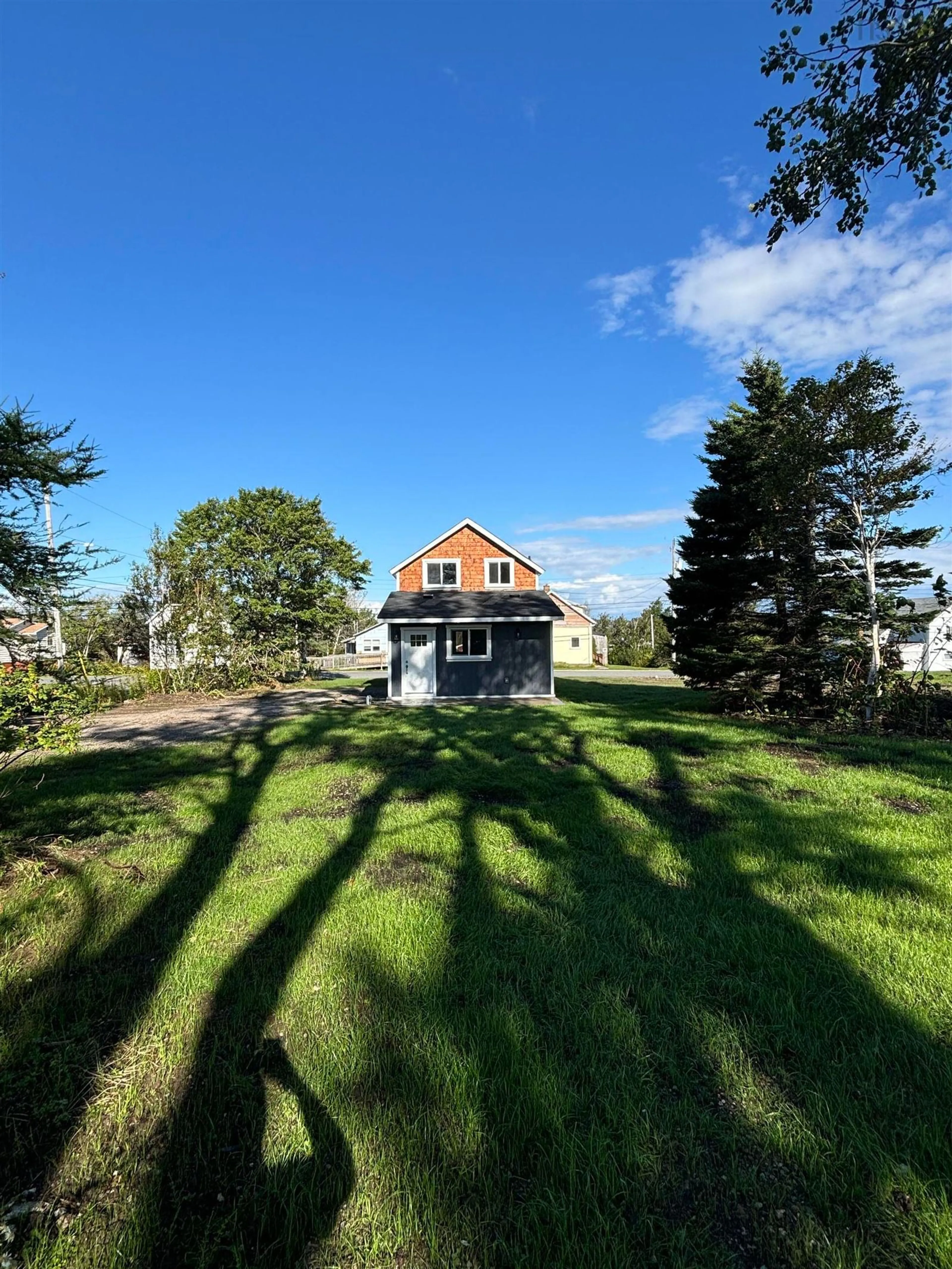 A pic from exterior of the house or condo, the fenced backyard for 47 School St, Glace Bay Nova Scotia B1A 1J3