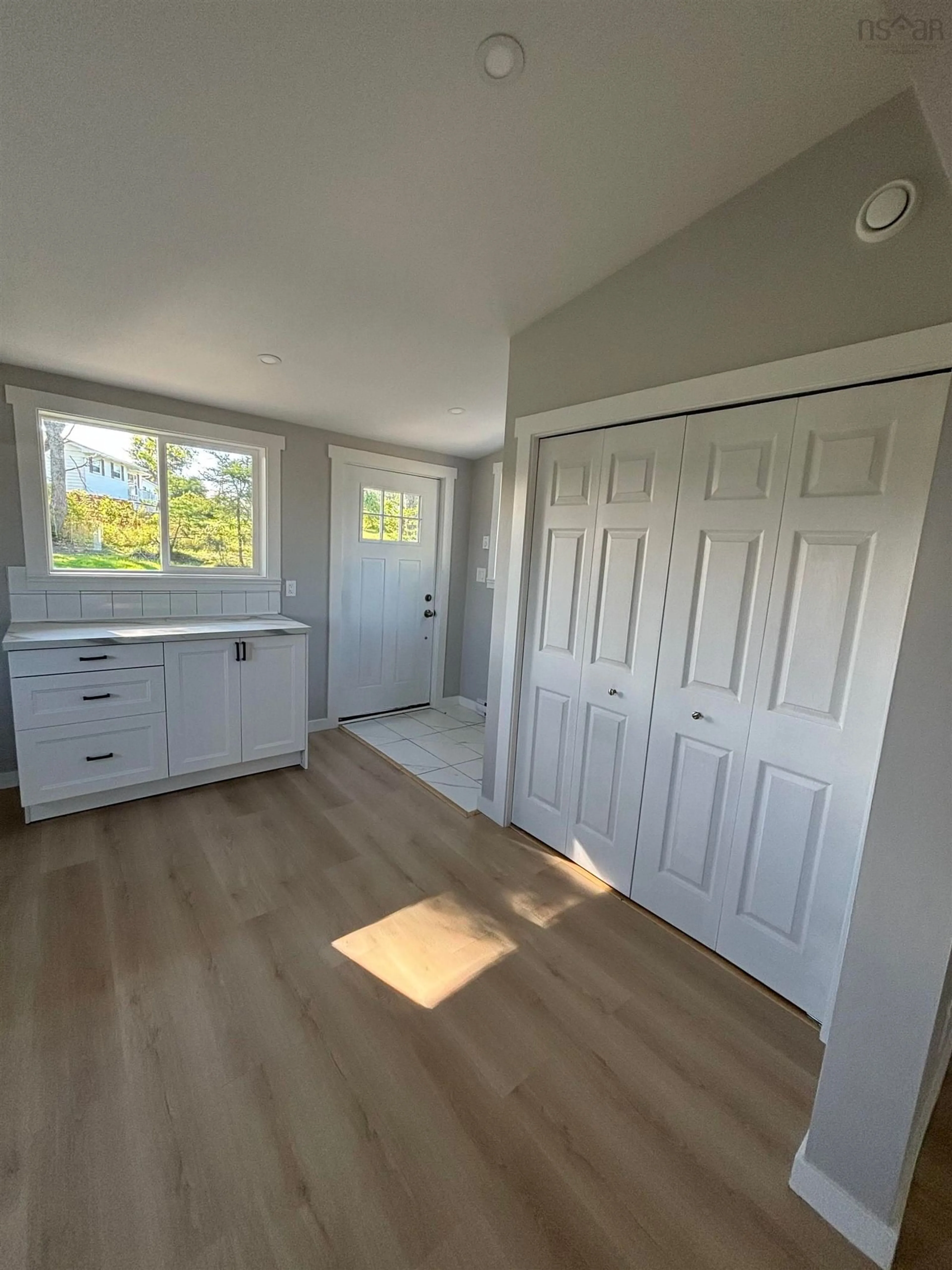 A pic of a room, wood floors for 47 School St, Glace Bay Nova Scotia B1A 1J3