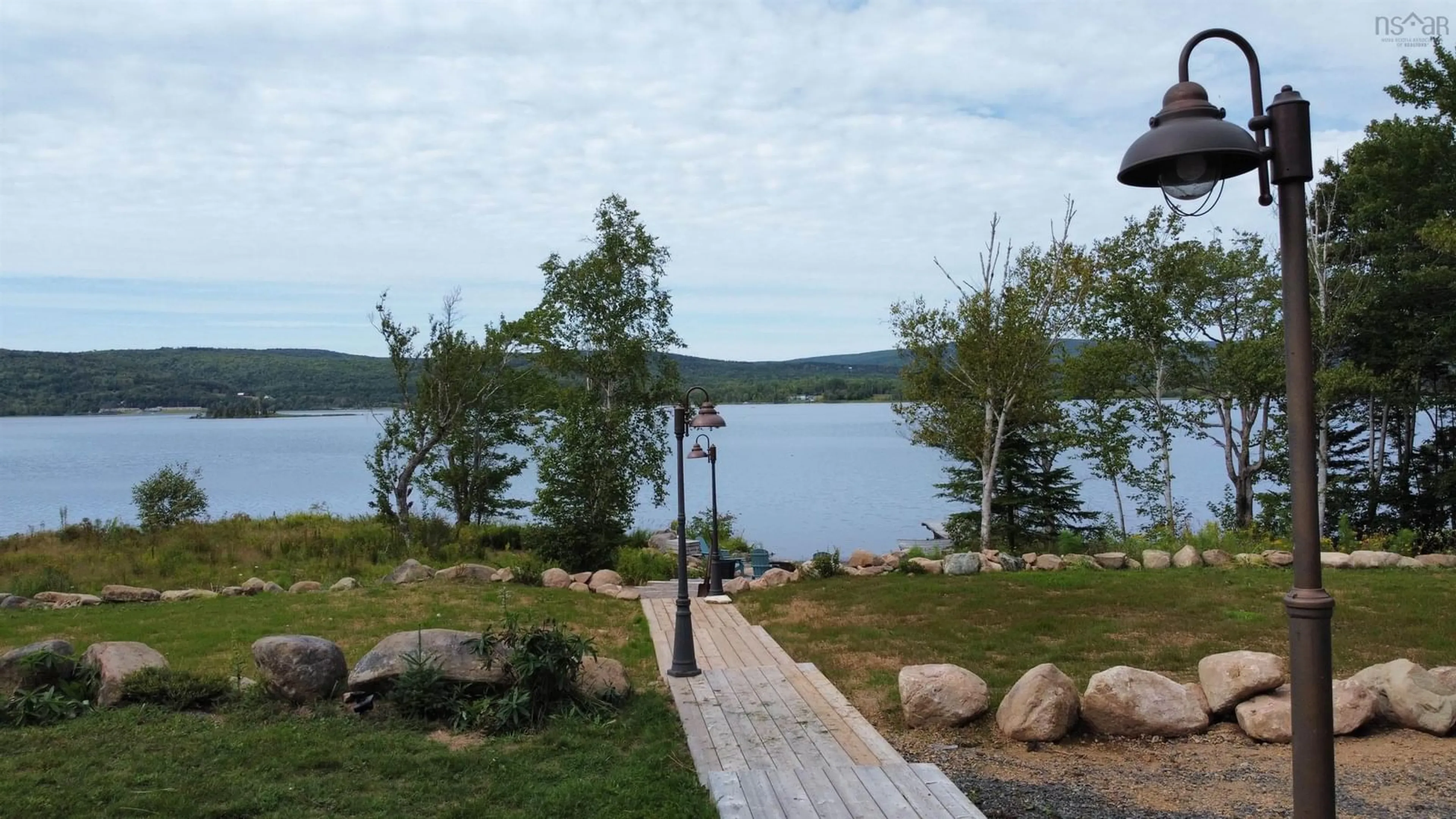 Patio, water/lake/river/ocean view for 152 Mersey Rd, Inlet Baddeck Nova Scotia B0E 1B0