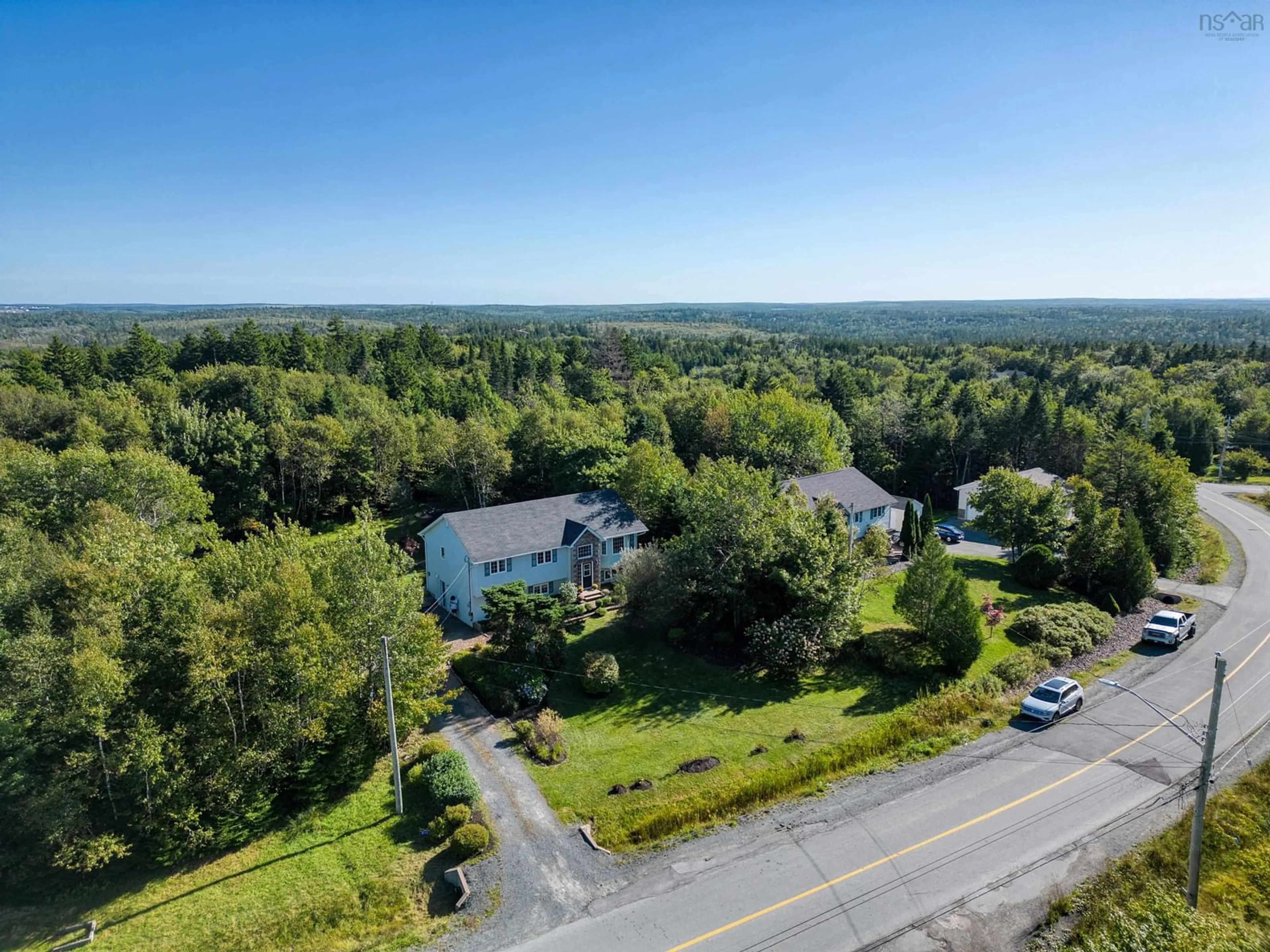 A pic from exterior of the house or condo, the street view for 411 Kingswood Dr, Hammonds Plains Nova Scotia B4B 1M2