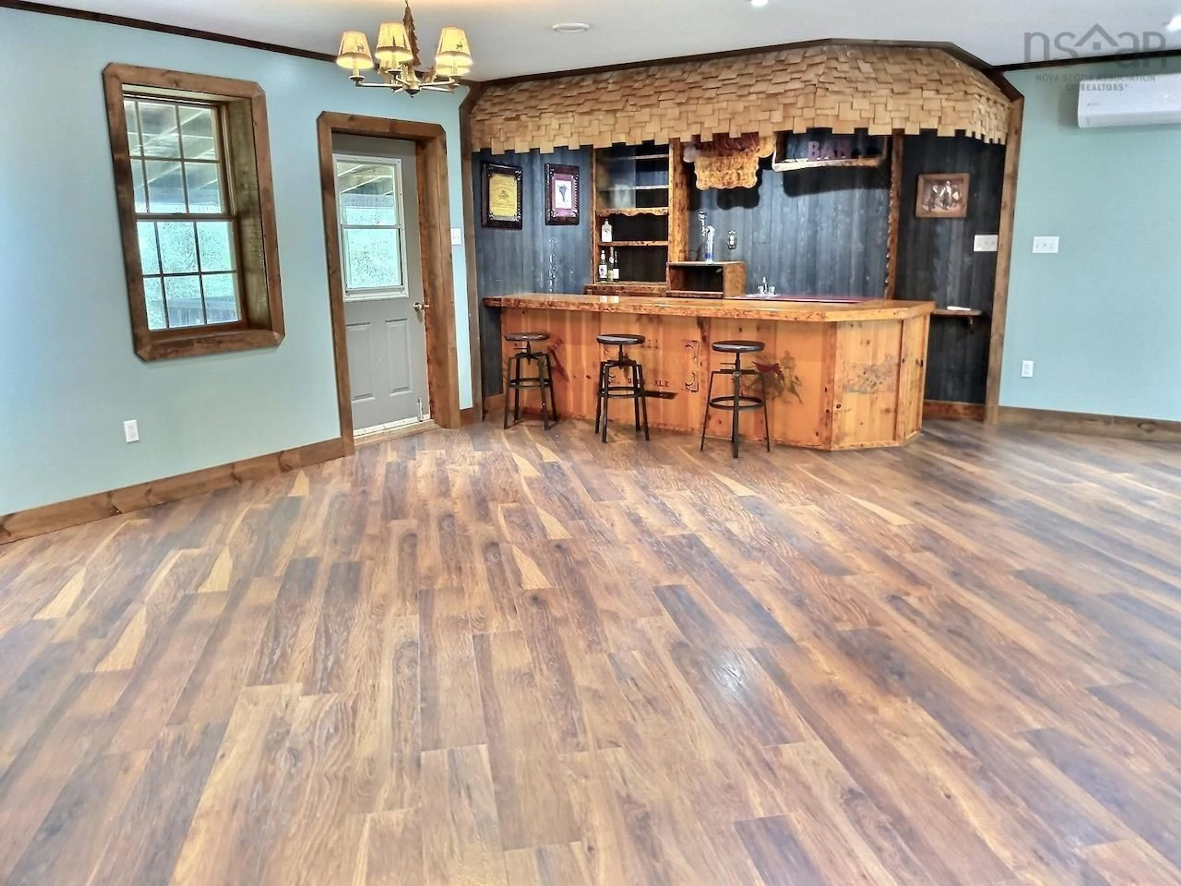 Open concept kitchen, wood/laminate floor for 944 Burgess Mountain Rd, Cambridge Nova Scotia B0P 1G0