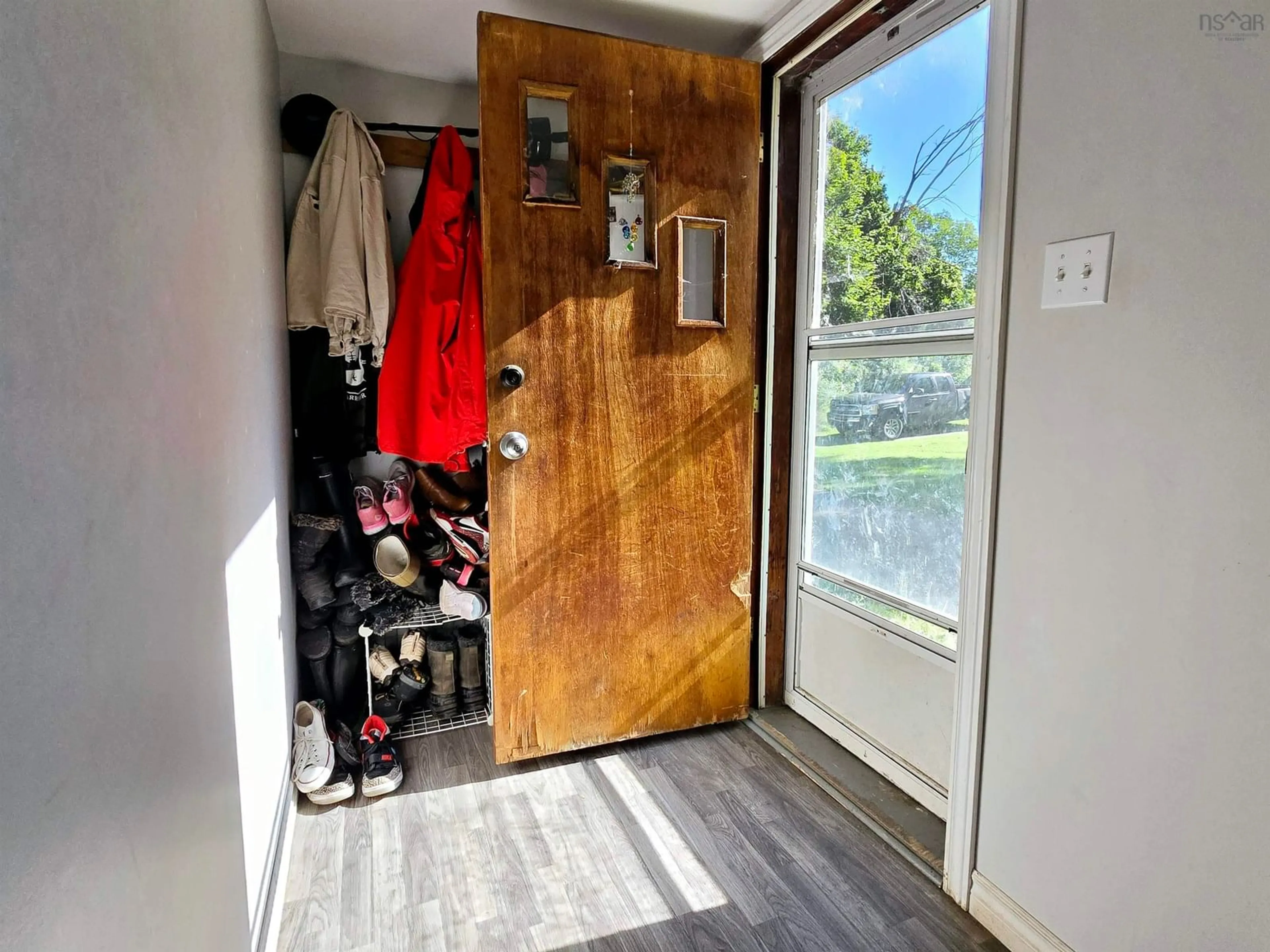 Indoor entryway, wood floors for 29 Edward St, Plymouth Nova Scotia B0K 1S0