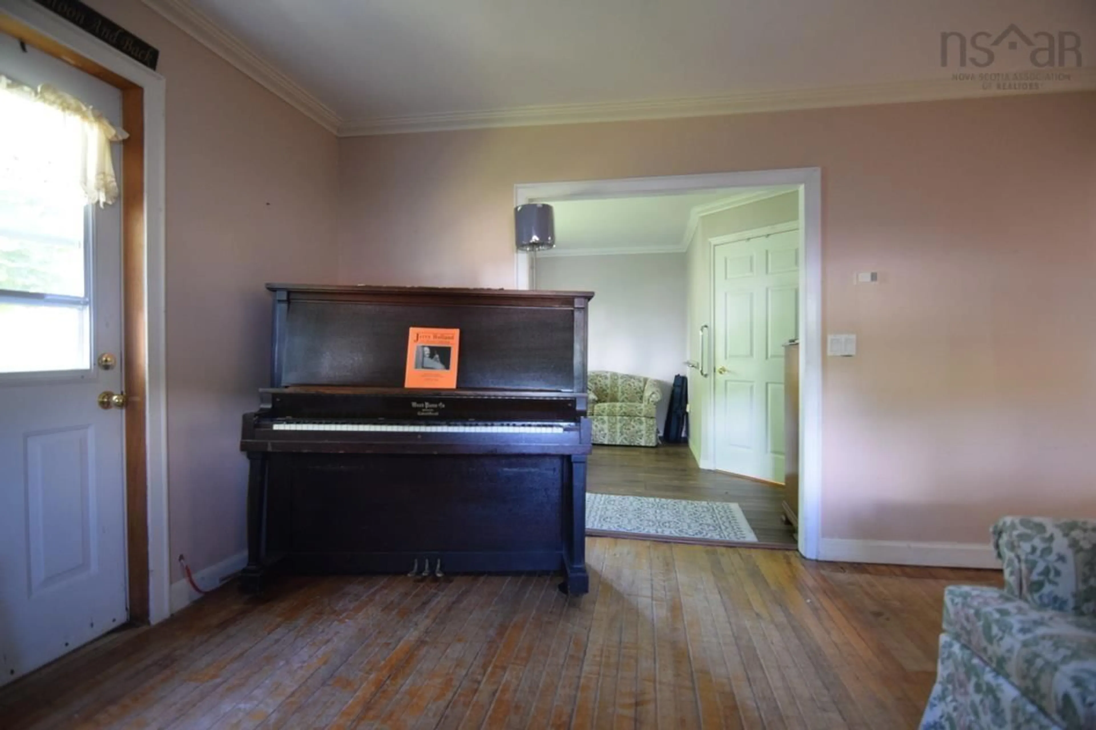 A pic of a room, wood floors for 55 Highland St, Mabou Nova Scotia B0E 1N0