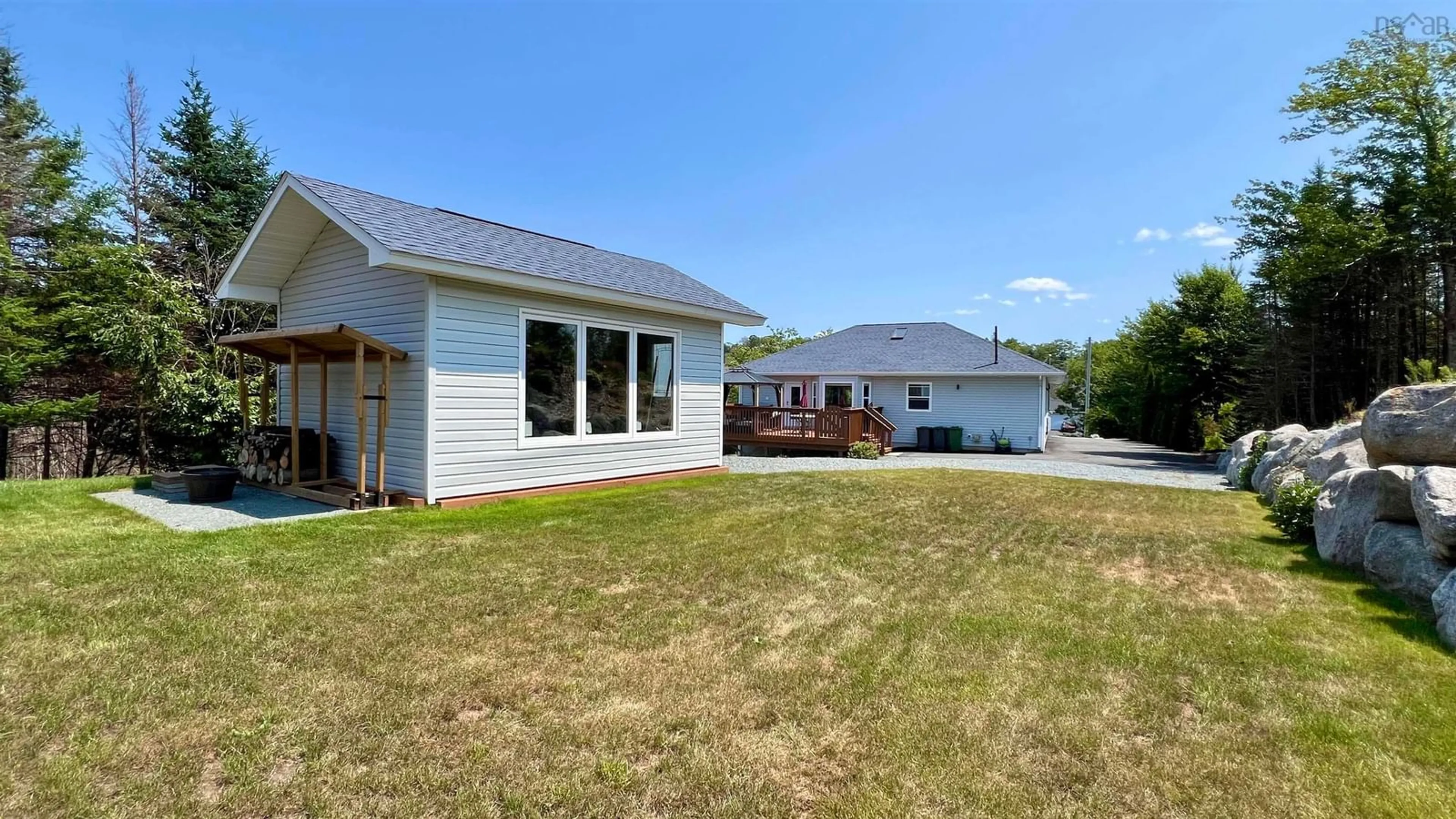 Frontside or backside of a home, the fenced backyard for 26 Haverstock Dr, Hammonds Plains Nova Scotia B3Z 1P2