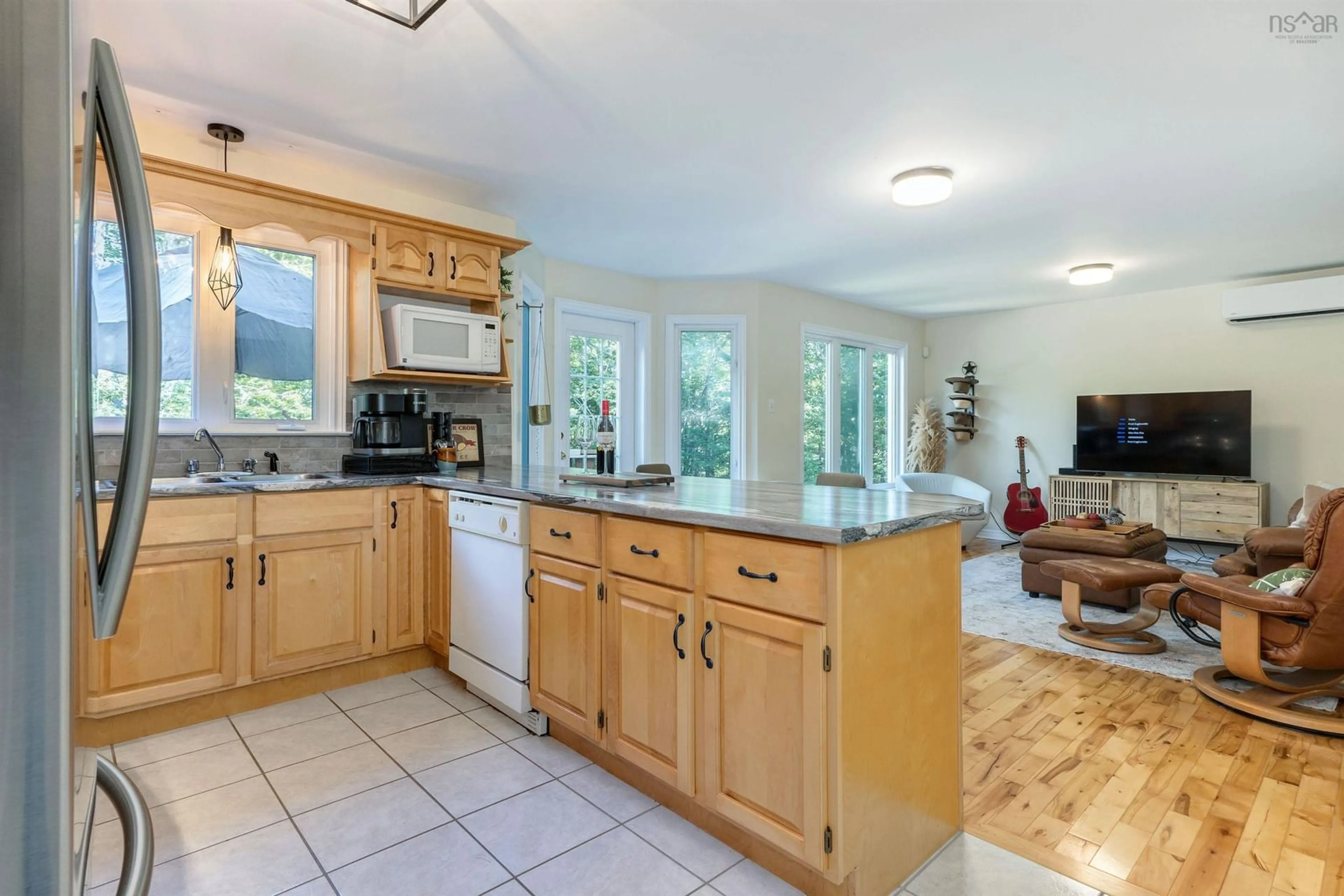 Open concept kitchen for 2 Travis Crt, Cow Bay Nova Scotia B3G 1R1