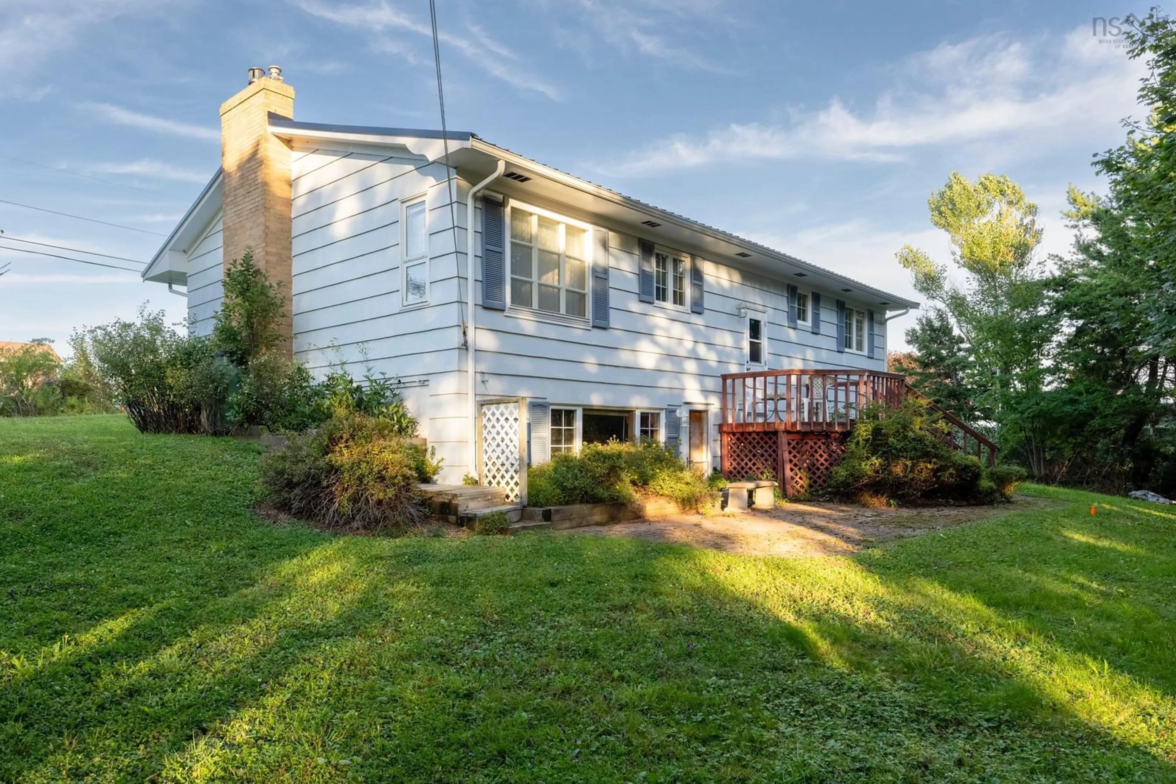 Frontside or backside of a home, the fenced backyard for 55 Enslow Rd, Blue Rocks Nova Scotia B0J 2C0