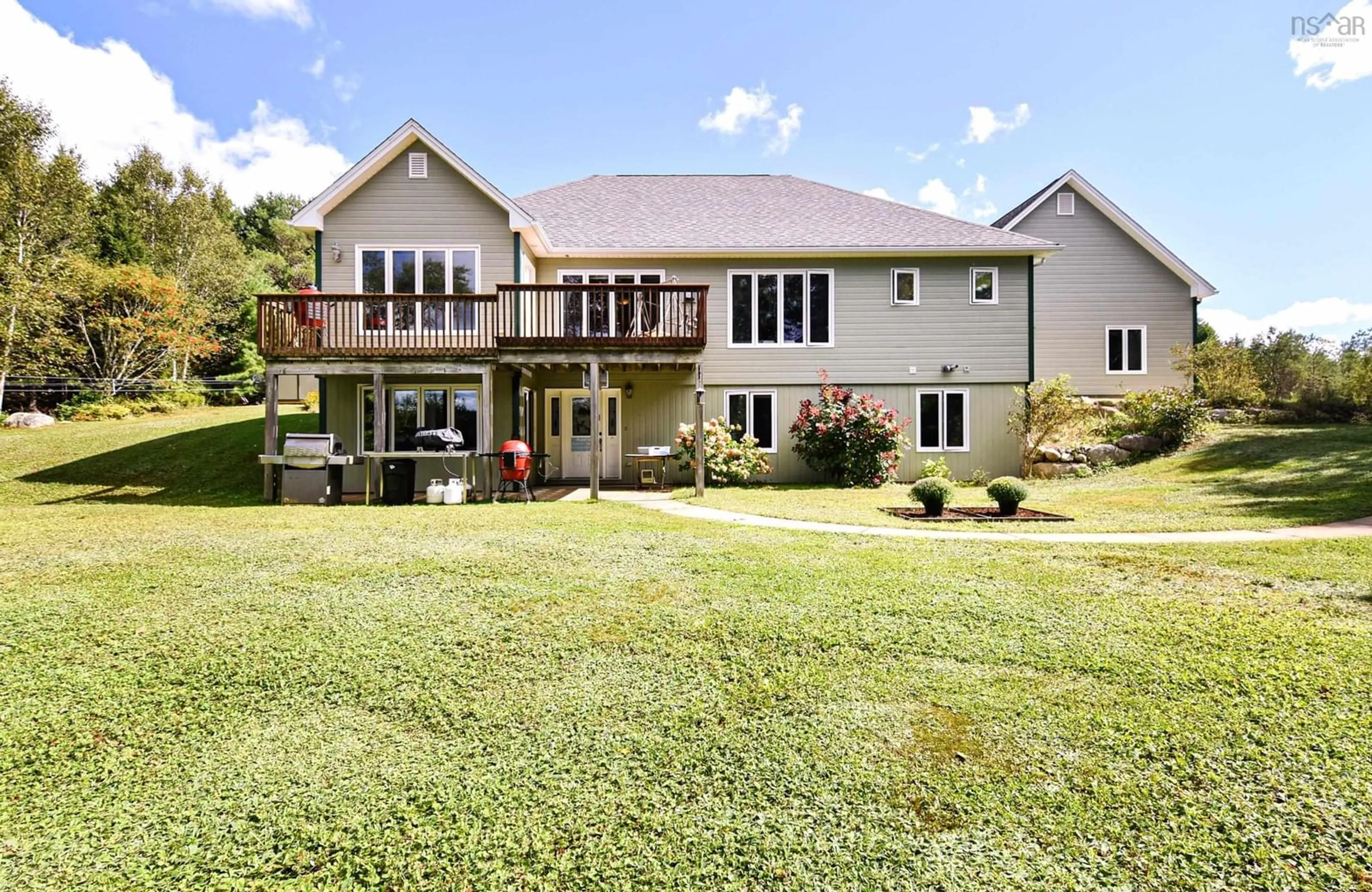 Frontside or backside of a home, the fenced backyard for 122 Goat Lake Road, East Chester Nova Scotia B0J 1J0