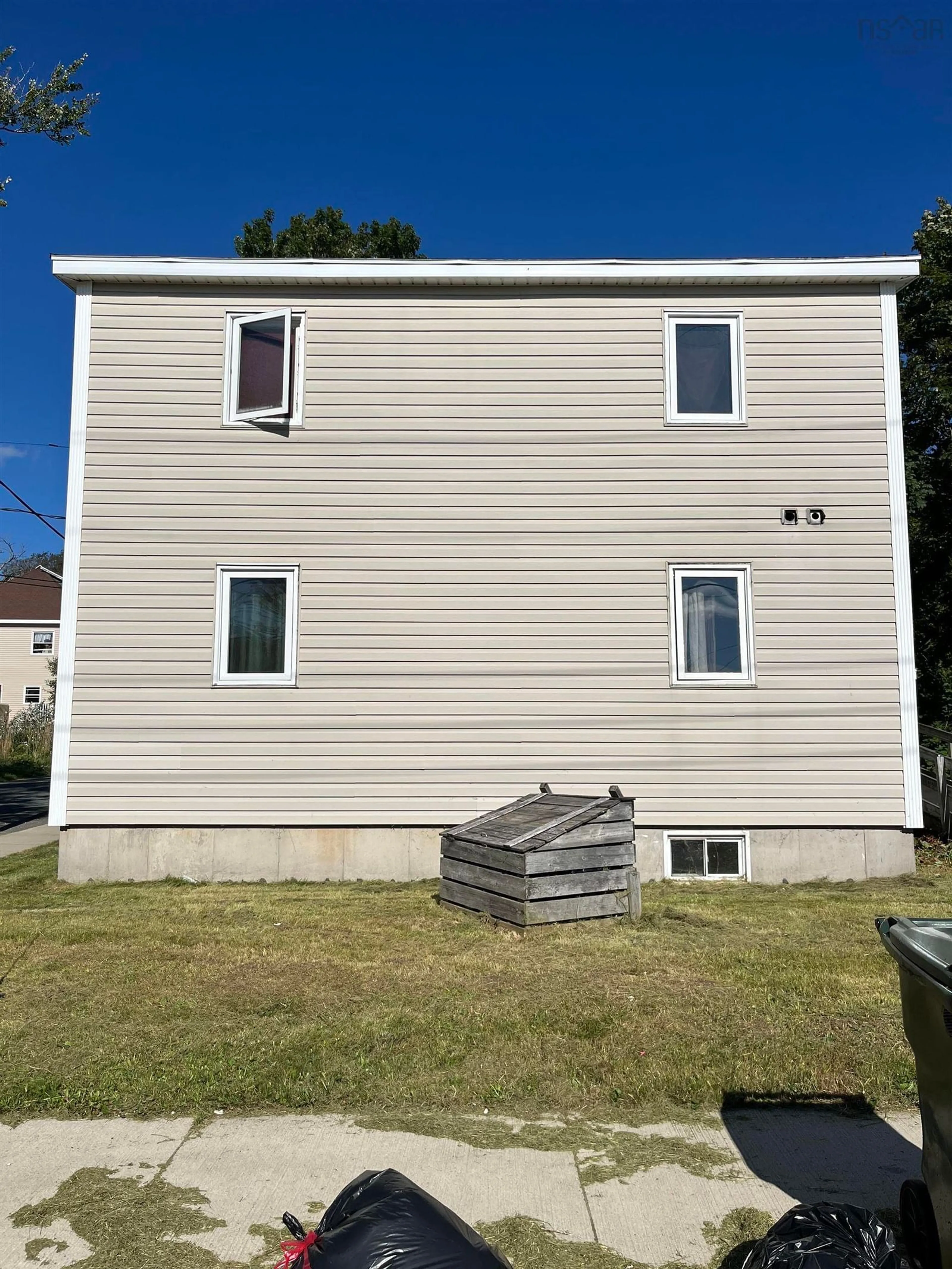 Frontside or backside of a home, the front or back of building for 18 Lower Mclean St, Glace Bay Nova Scotia B1A 2K6