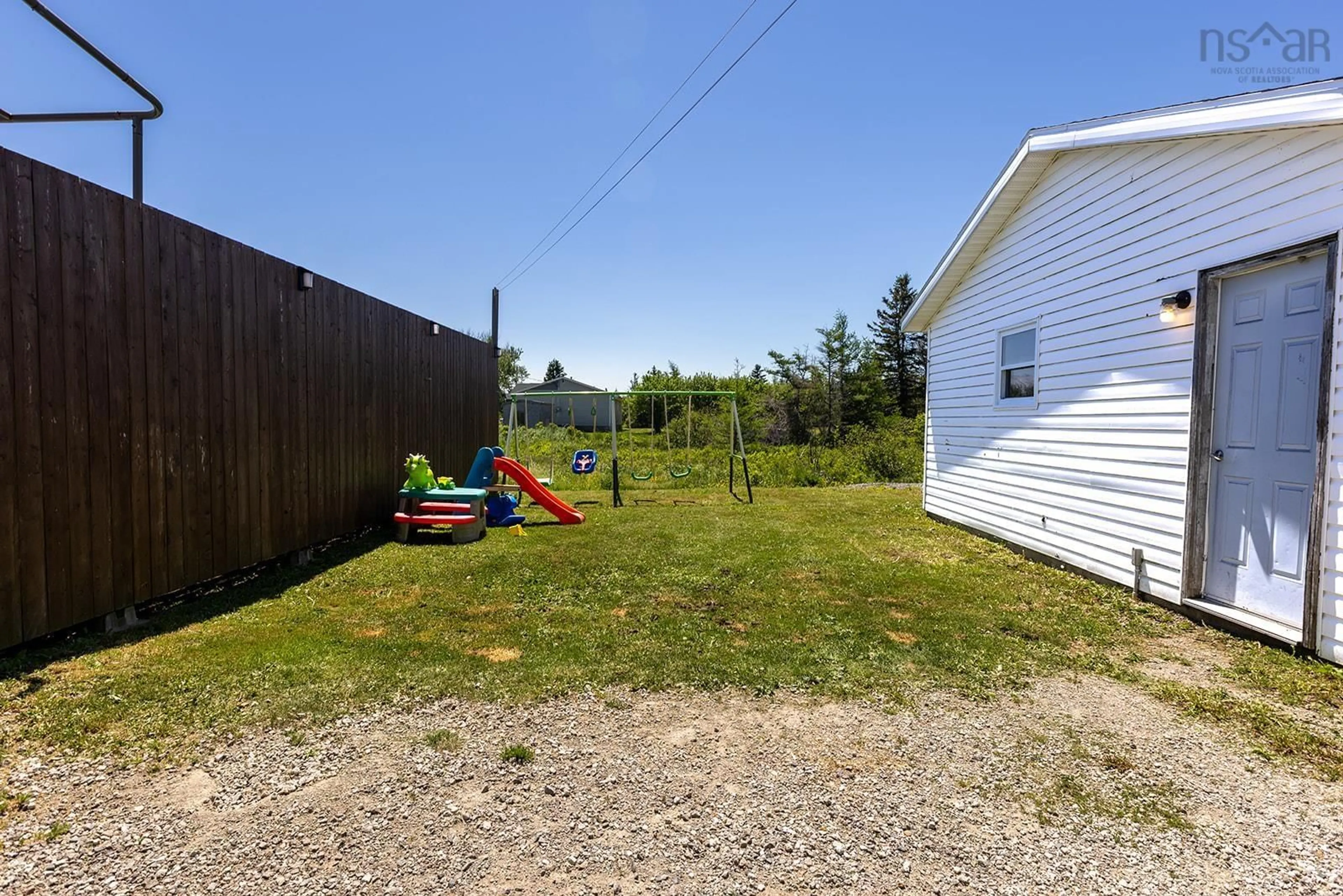 Patio, the fenced backyard for 70 Birch St, Port Morien Nova Scotia B1B 1A5