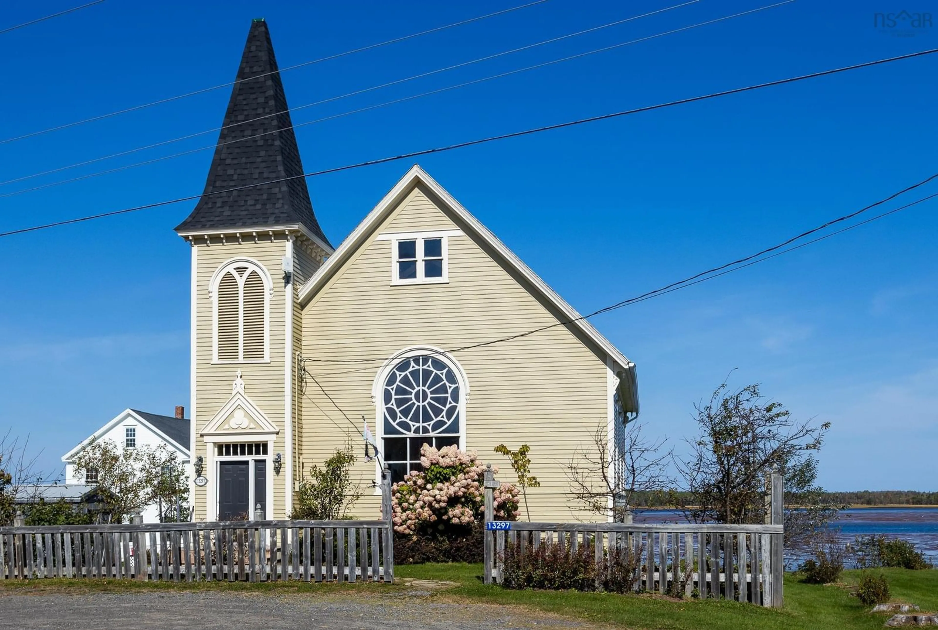 Frontside or backside of a home, the front or back of building for 13297 Highway 6, Wallace Bridge Nova Scotia B0K 1Y0