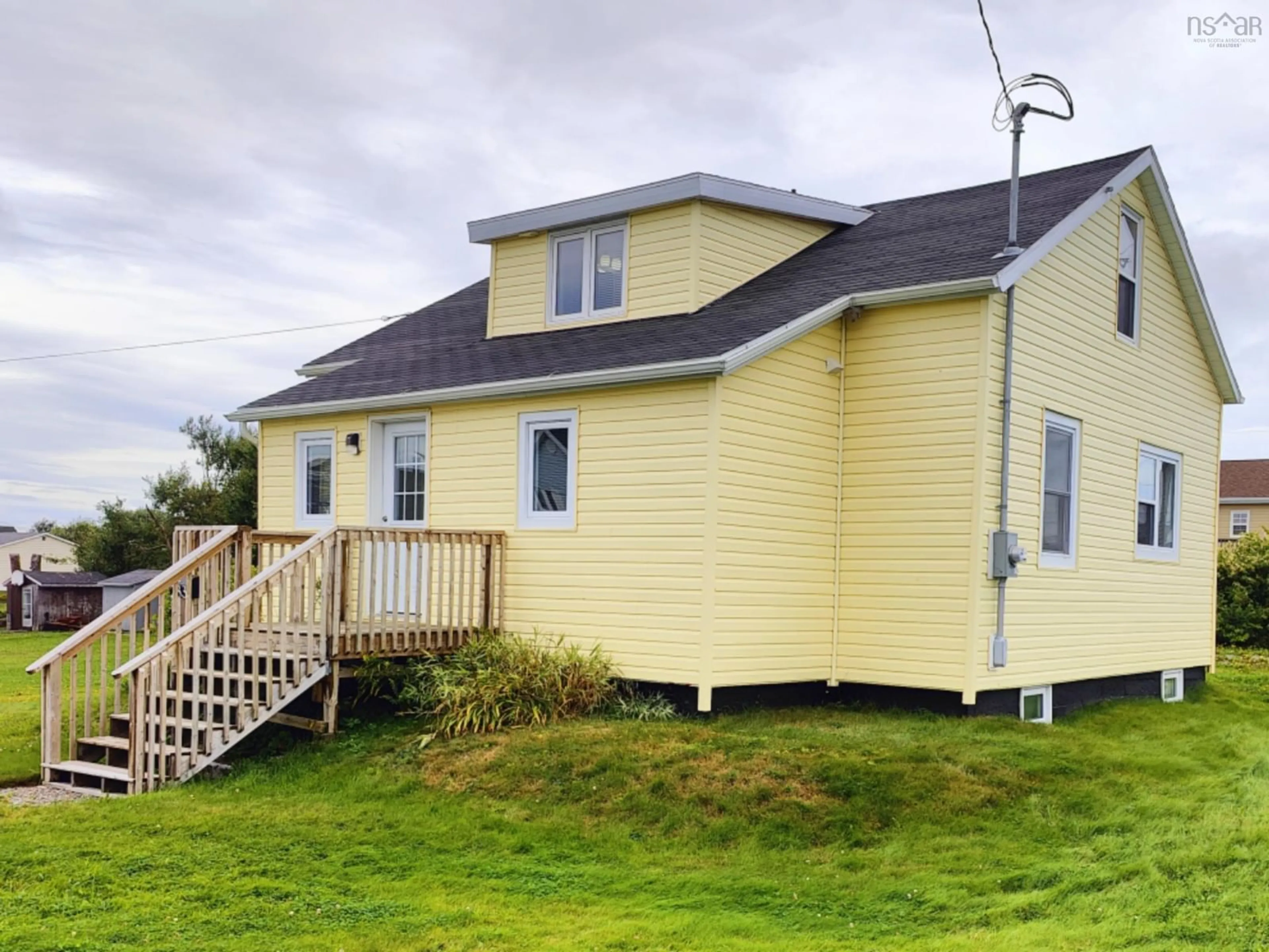 Frontside or backside of a home, cottage for 233 James St, New Waterford Nova Scotia B1H 2X9