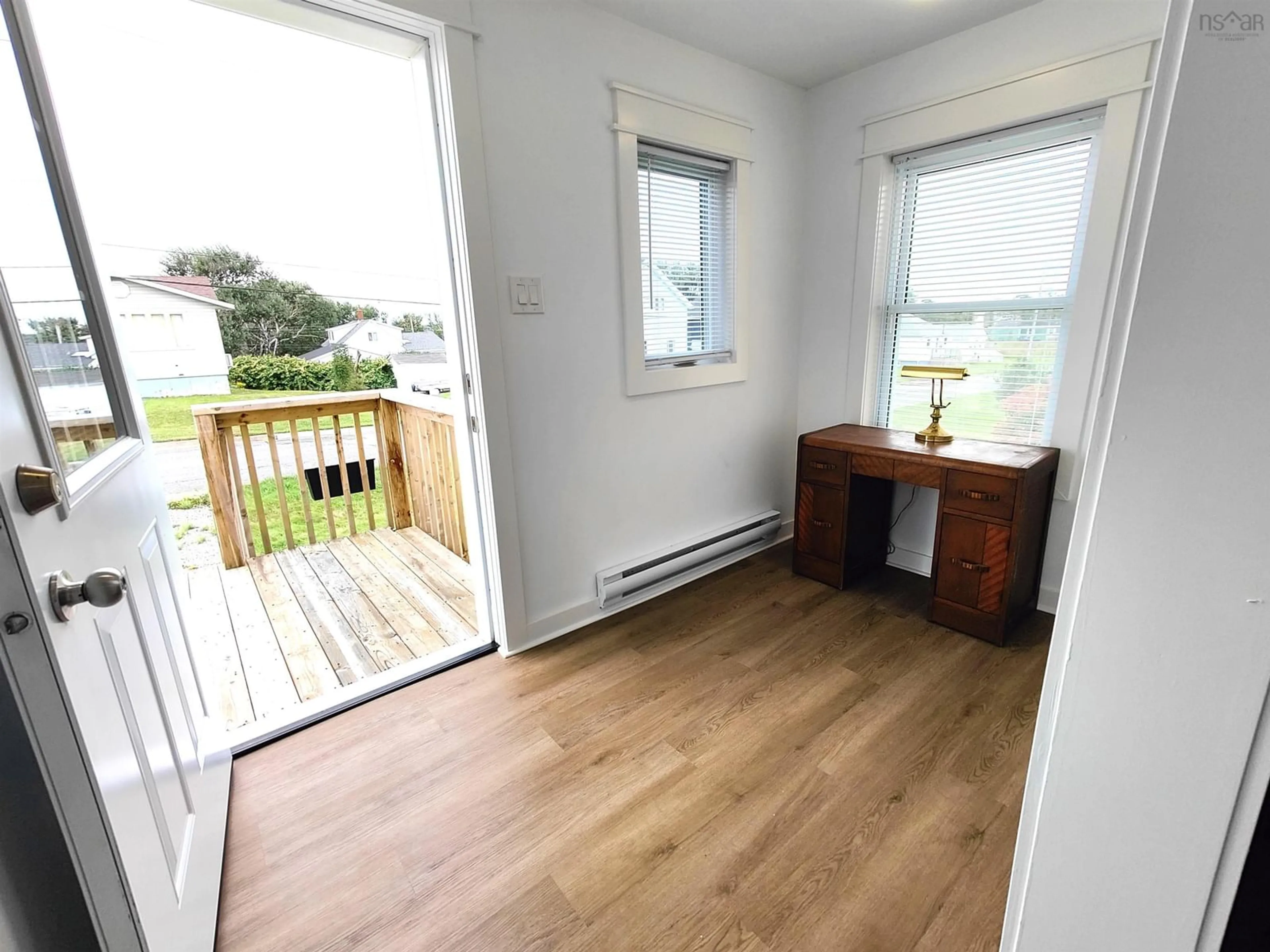 A pic of a room, wood floors for 233 James St, New Waterford Nova Scotia B1H 2X9