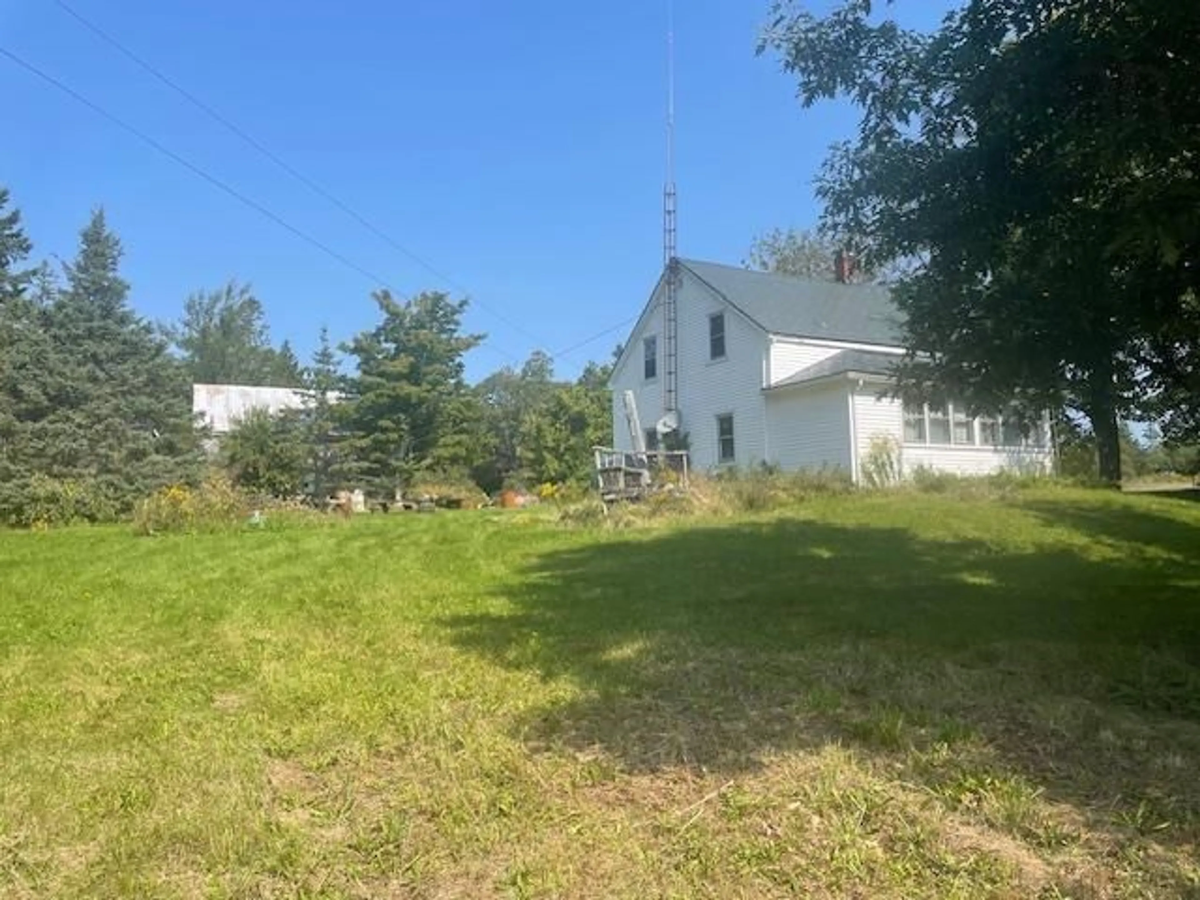 Frontside or backside of a home, the fenced backyard for 4151 Highway 358, South Scots Bay Nova Scotia B0P 1H0