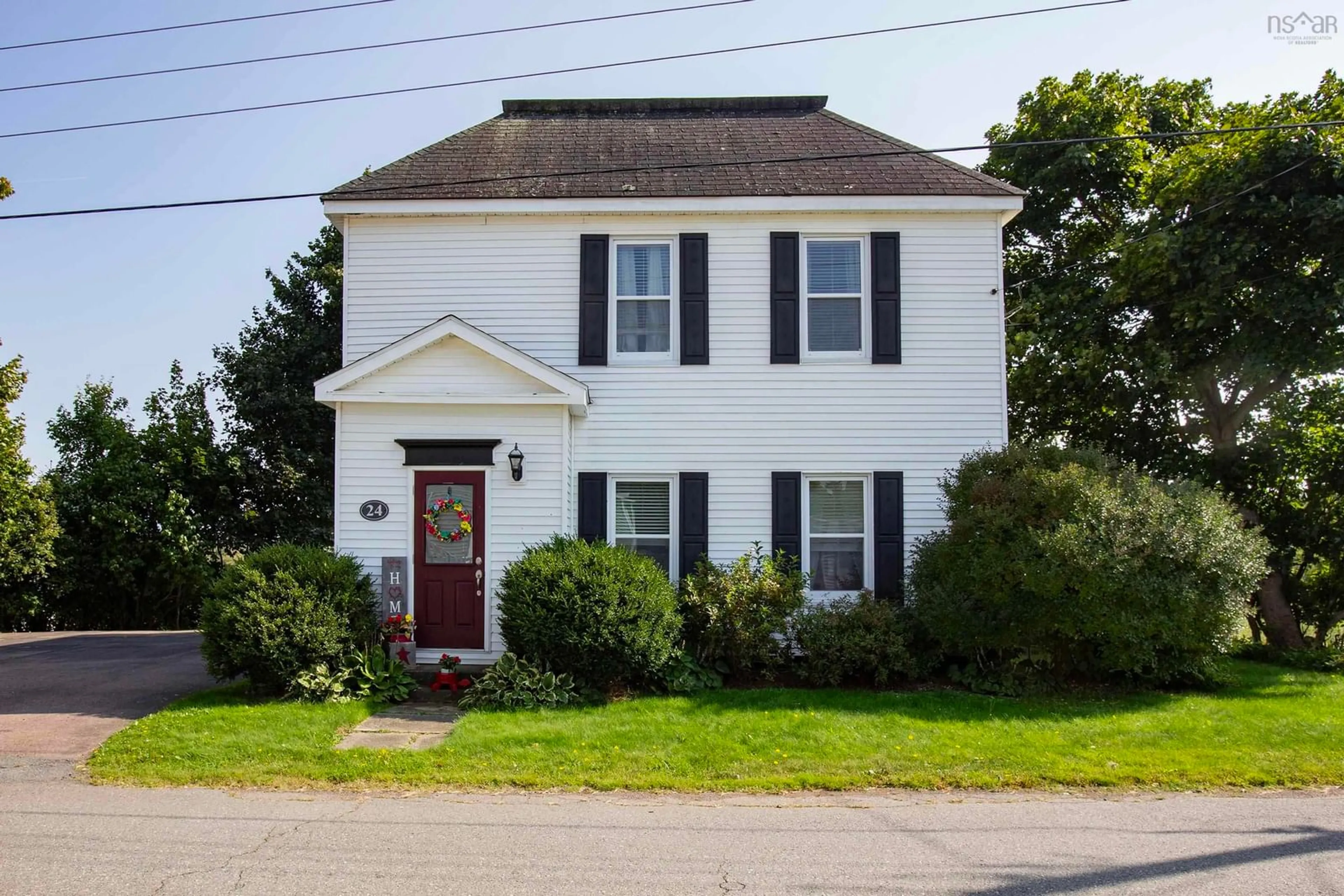 Frontside or backside of a home, cottage for 24 Pleasant St, Parrsboro Nova Scotia B0M 1S0