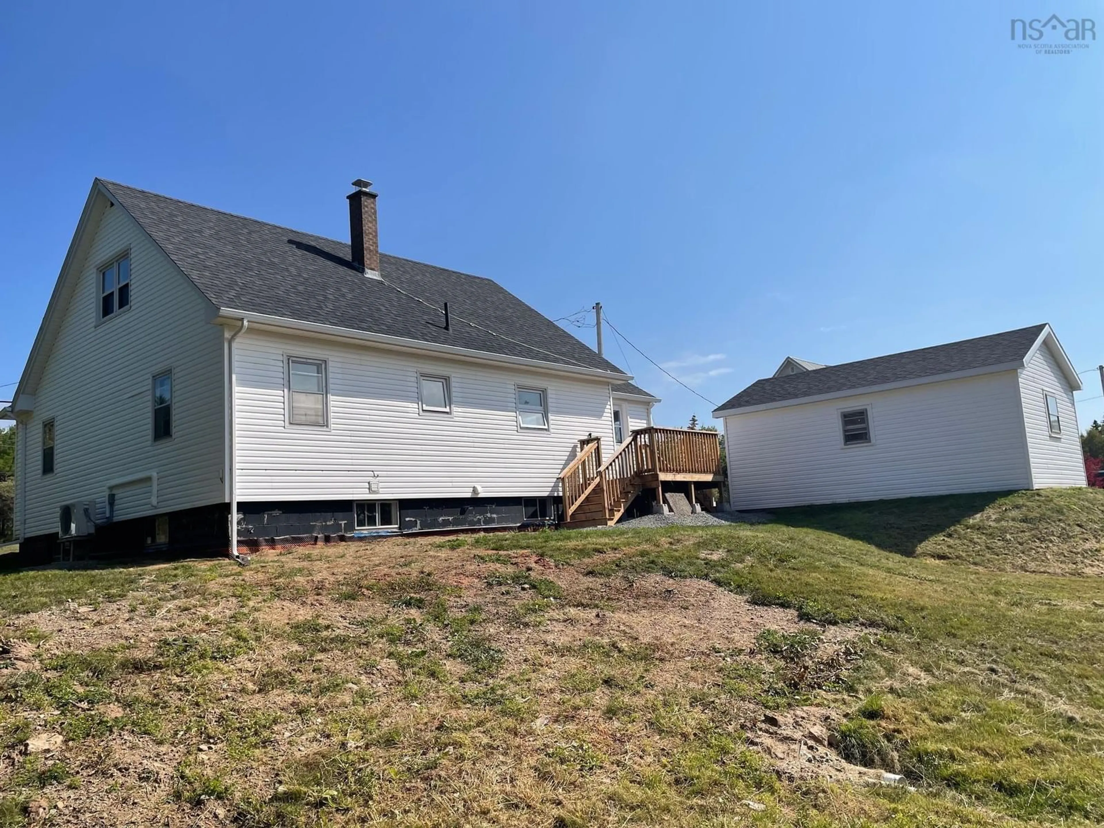 Frontside or backside of a home, the fenced backyard for 887 Highway 19, Troy Nova Scotia B9A 1E9