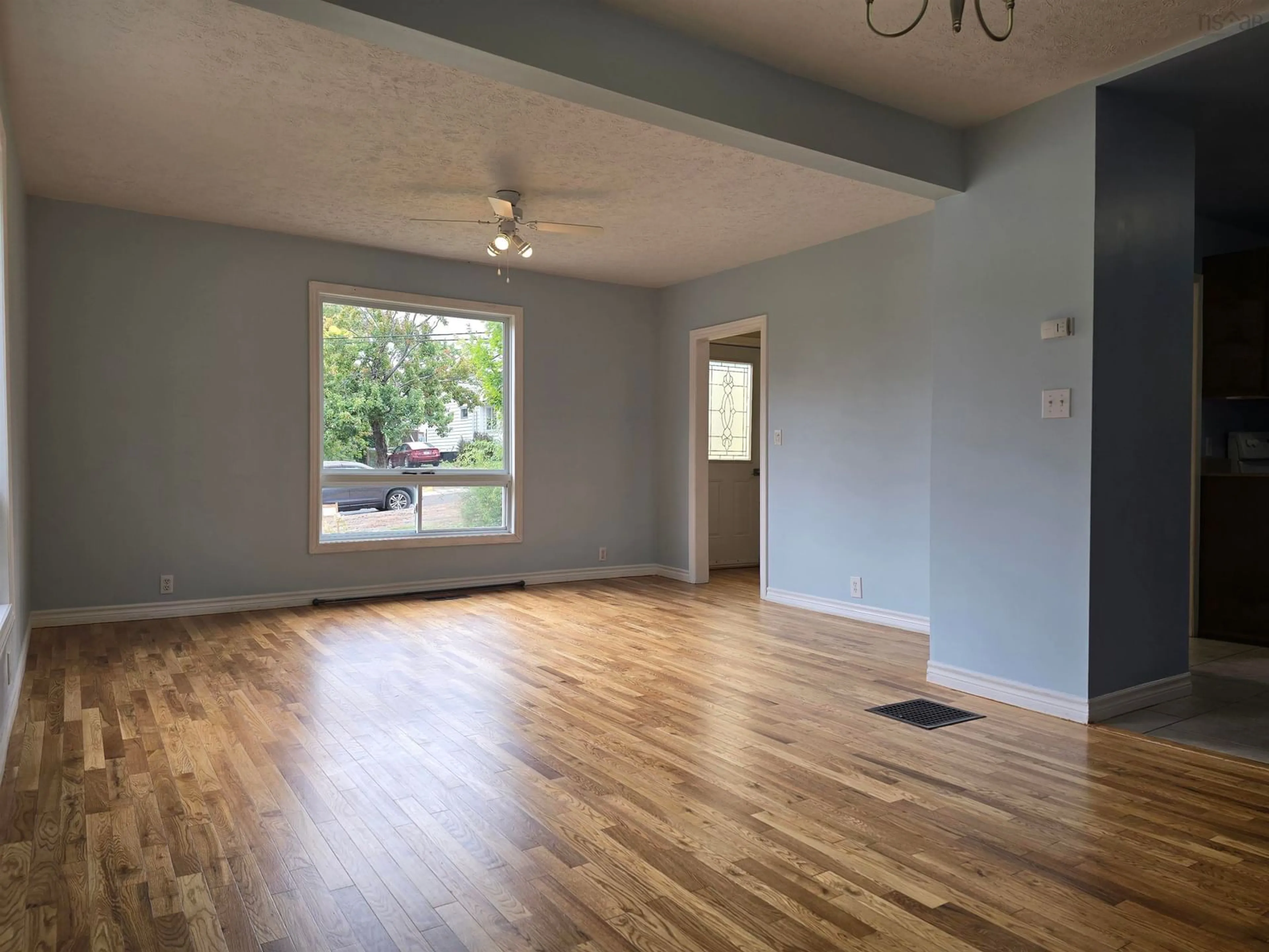 A pic of a room, wood floors for 56 Claremont Ave, Stellarton Nova Scotia B0K 1S0