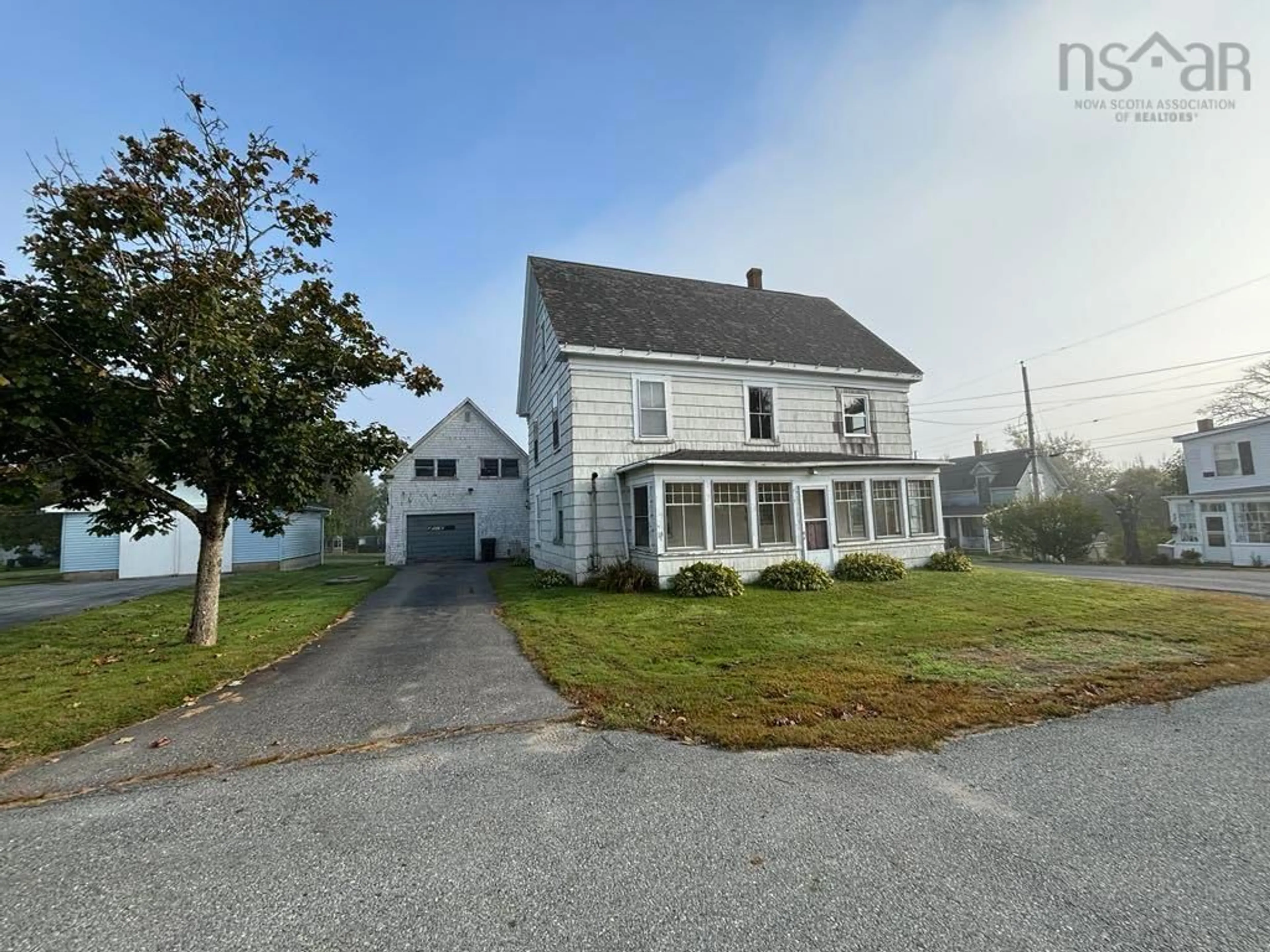 Frontside or backside of a home, the street view for 15 Hector St, Port Maitland Nova Scotia B5A 5R8