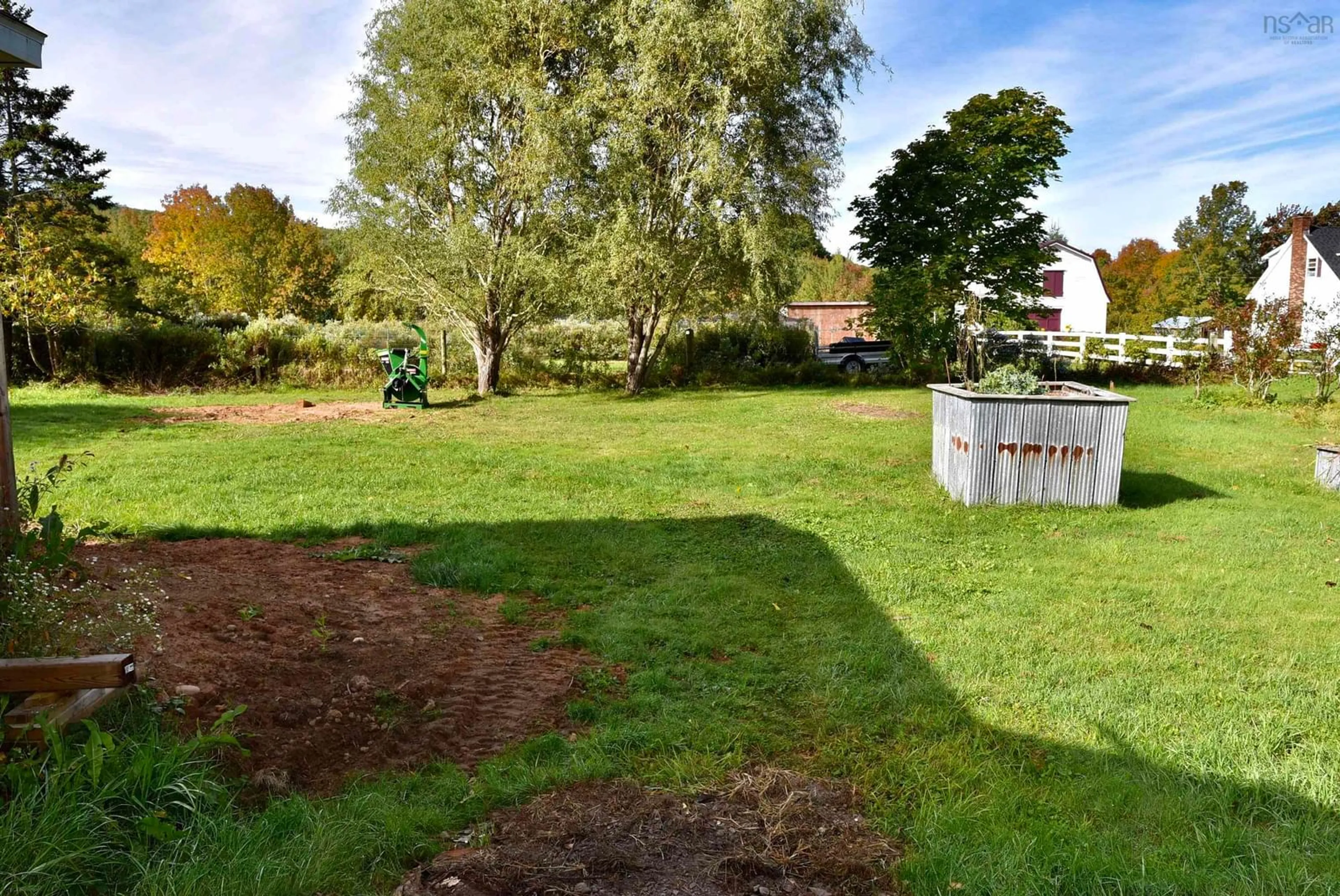 Patio, the fenced backyard for 133 Trout Lake Rd, Lawrencetown Nova Scotia B0S 1M0