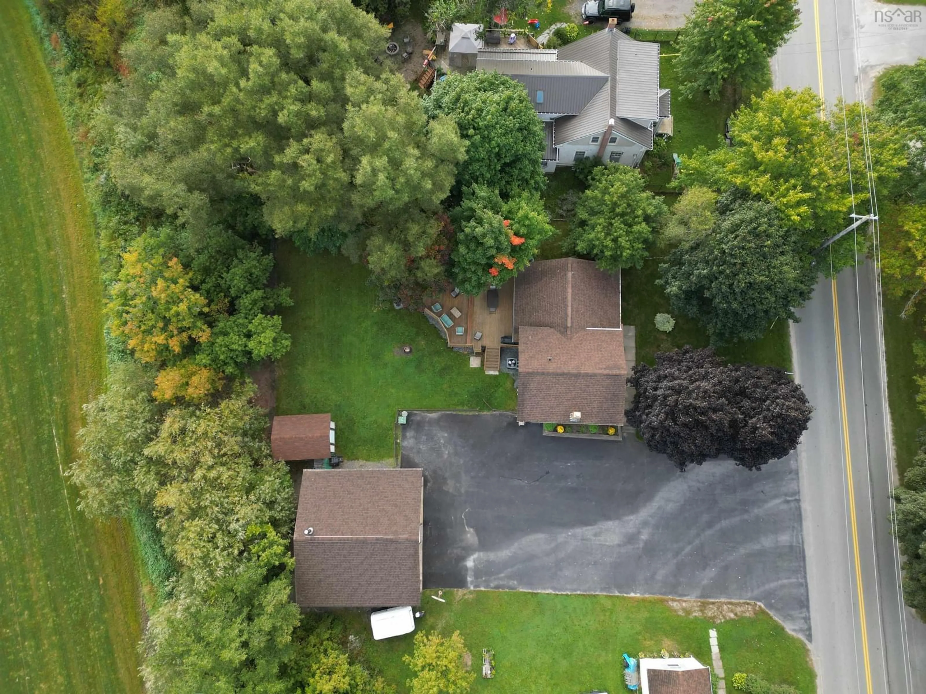 Frontside or backside of a home, the fenced backyard for 93 Elmsdale Rd, Elmsdale Nova Scotia B2S 1K7