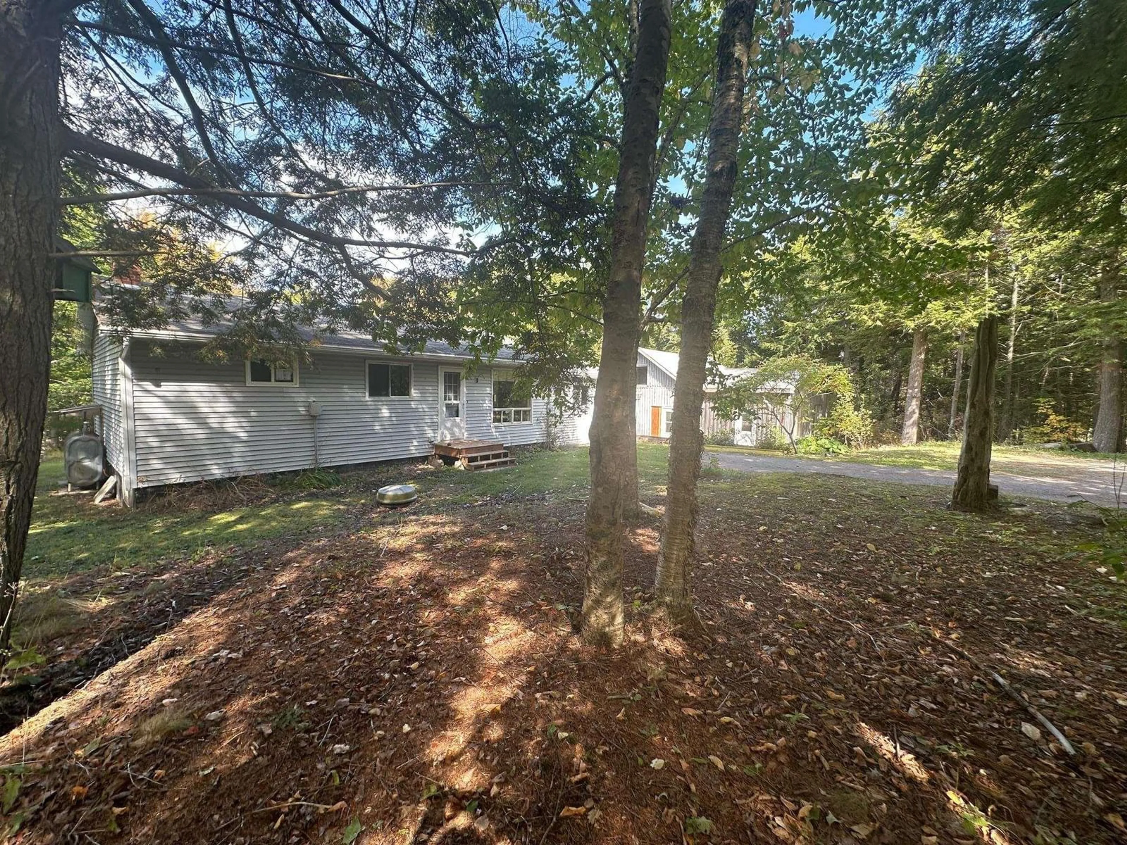 Frontside or backside of a home, the fenced backyard for 31 Thorburn Rd, Greenwood Nova Scotia B0K 1W0