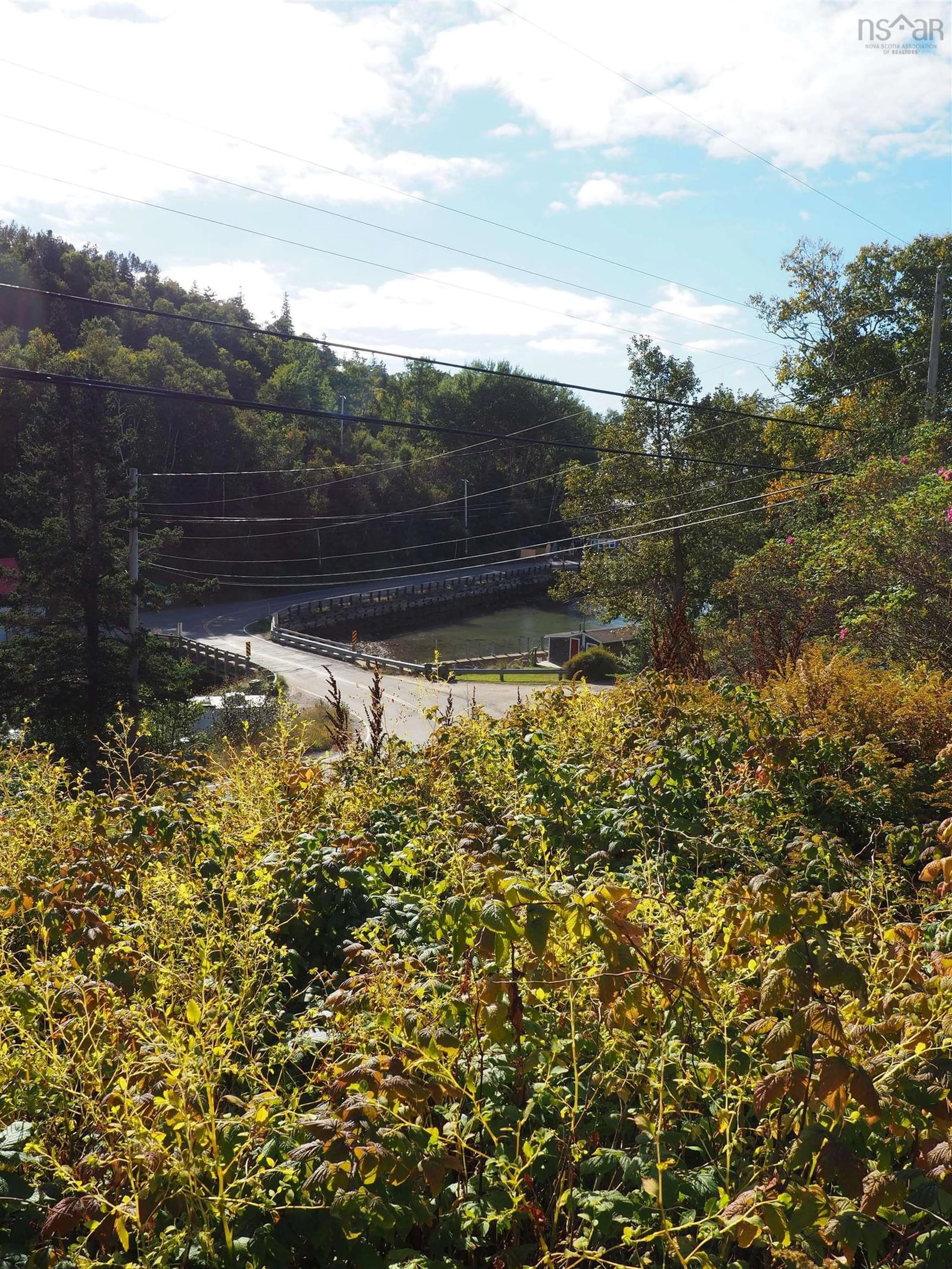 A pic from exterior of the house or condo, the street view for 2584 Highway 360, Harbourville Nova Scotia B0P 1E0