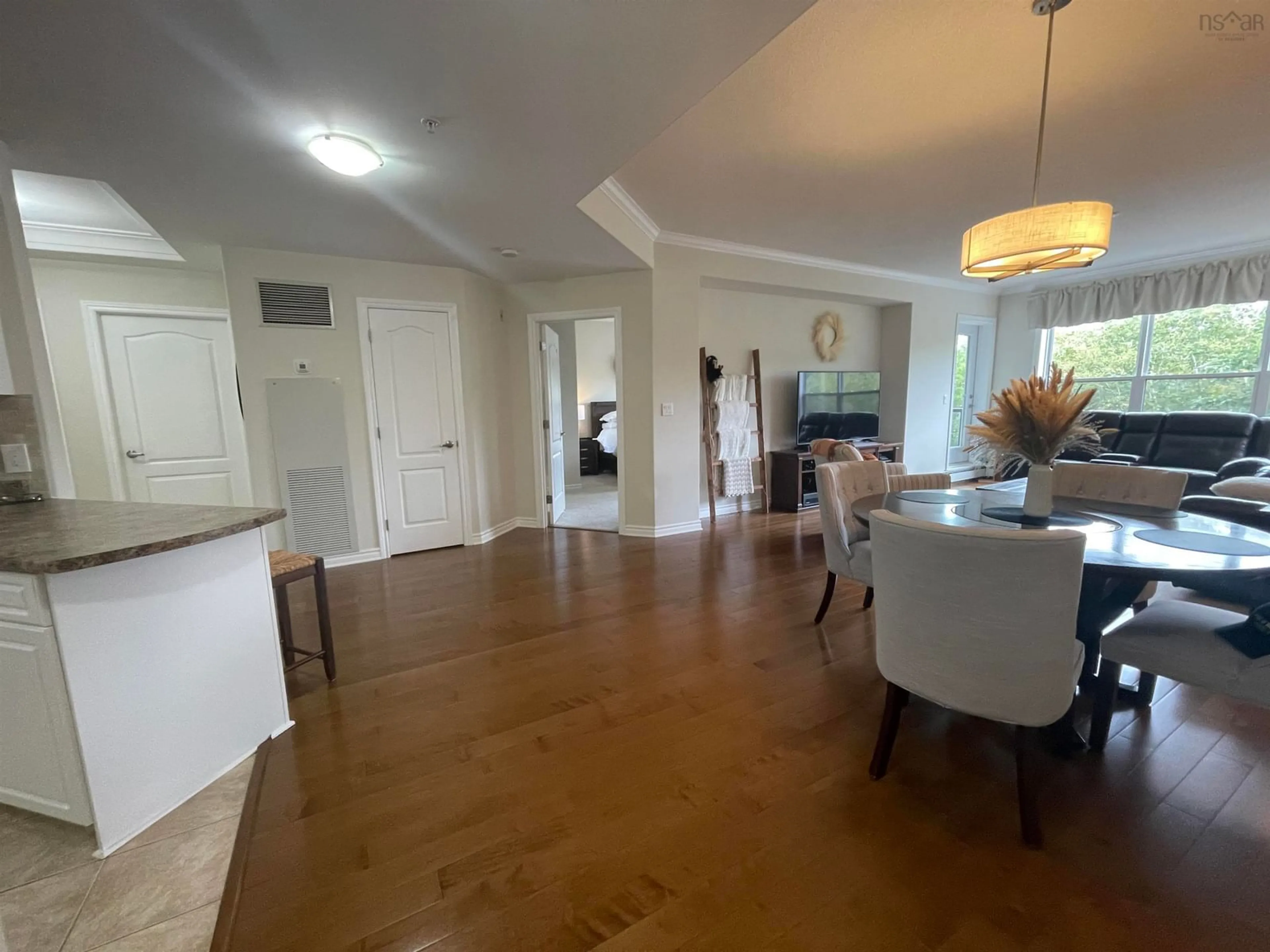 A pic of a room, wood floors for 120 Southgate Dr #108, Bedford Nova Scotia B4A 0B1