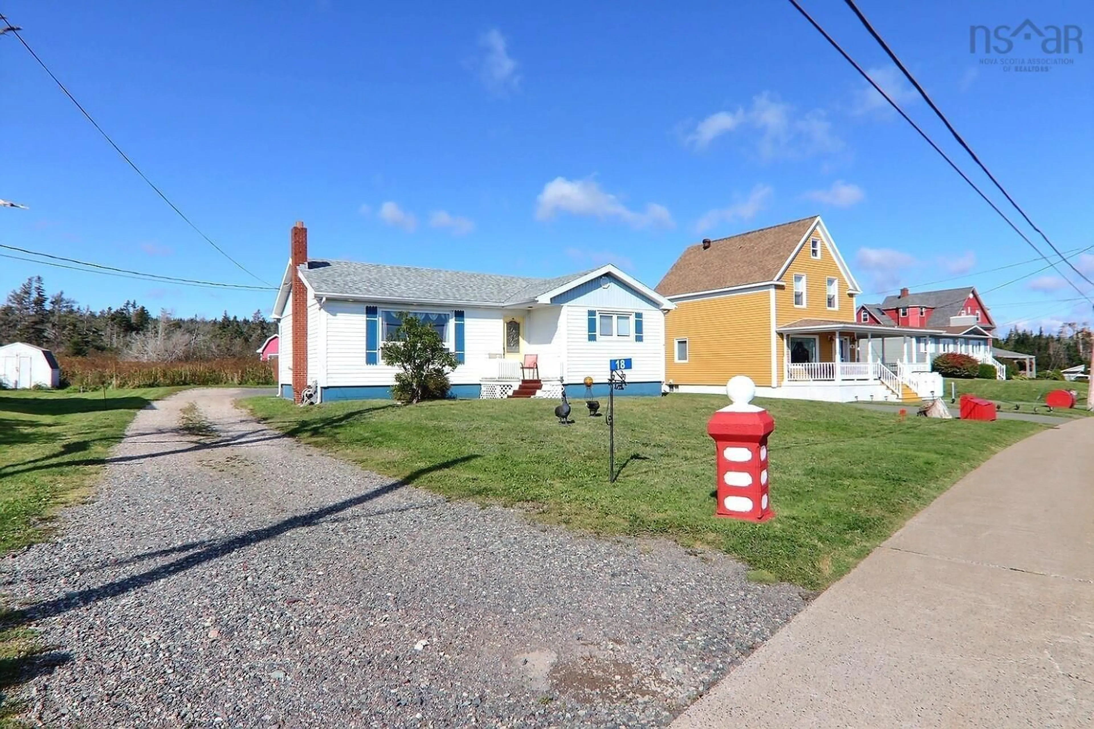 Frontside or backside of a home, the street view for 18 Wolfe Street, Louisbourg Nova Scotia B1C 2J2