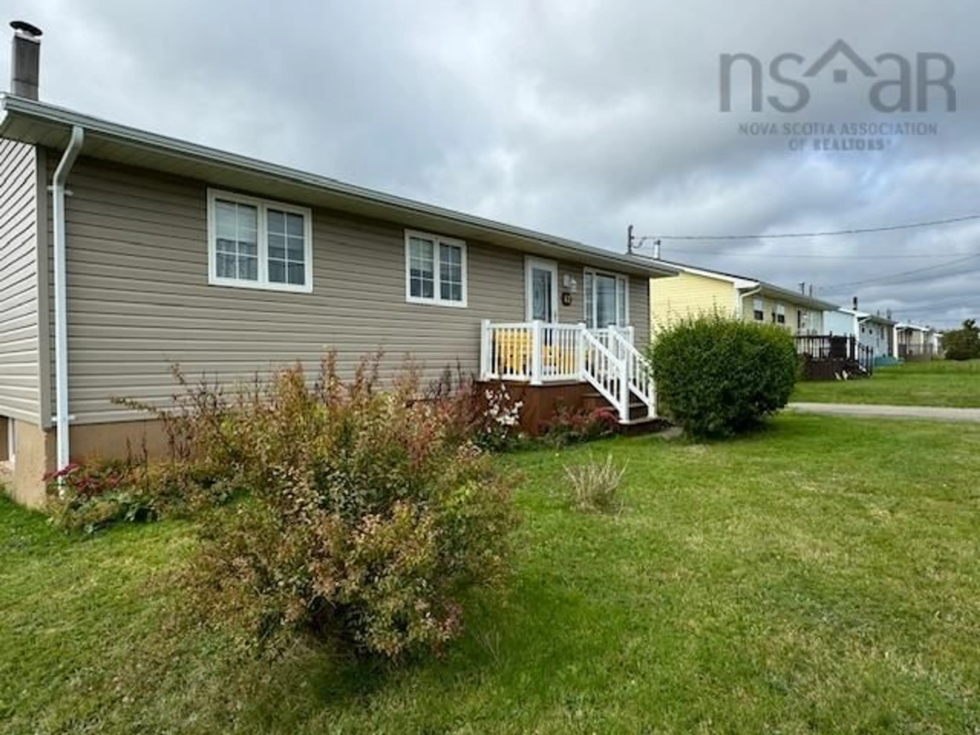 Frontside or backside of a home, cottage for 12 Oram St, Sydney Mines Nova Scotia B1V 2Z2