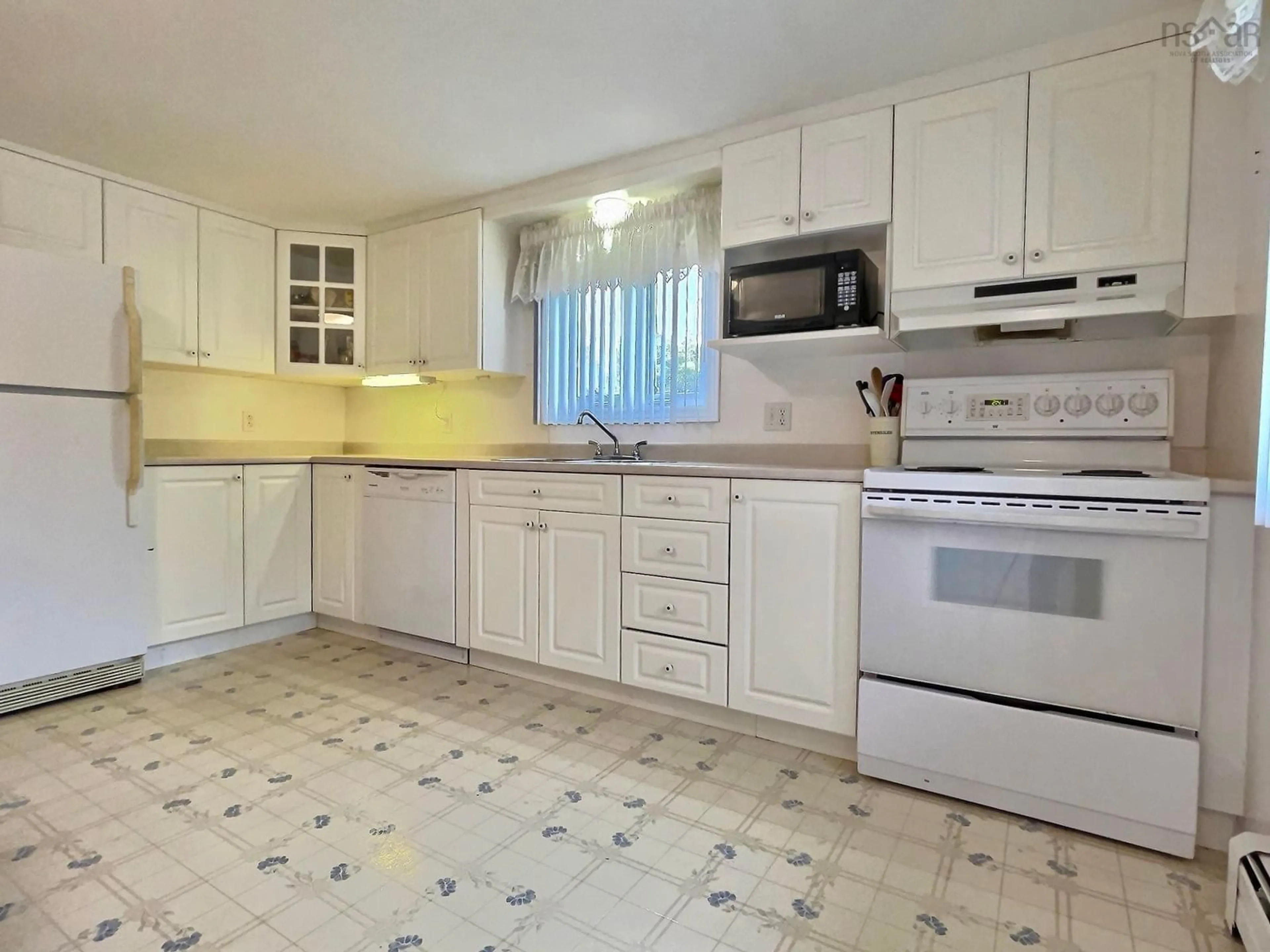 Standard kitchen, ceramic floors, cottage for 16391 Cabot Trail Rd, La Prairie Nova Scotia B0E 1H0