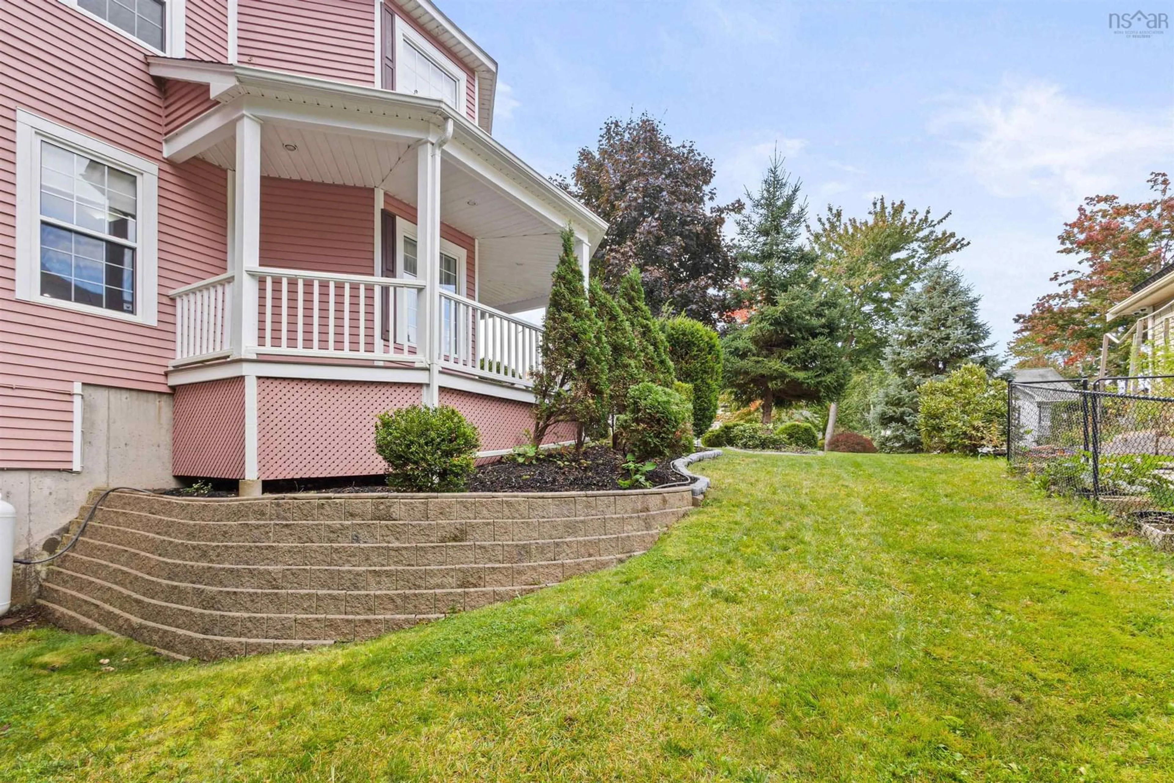 Frontside or backside of a home, the fenced backyard for 12 Anderson Blvd, Kentville Nova Scotia B4N 5G9