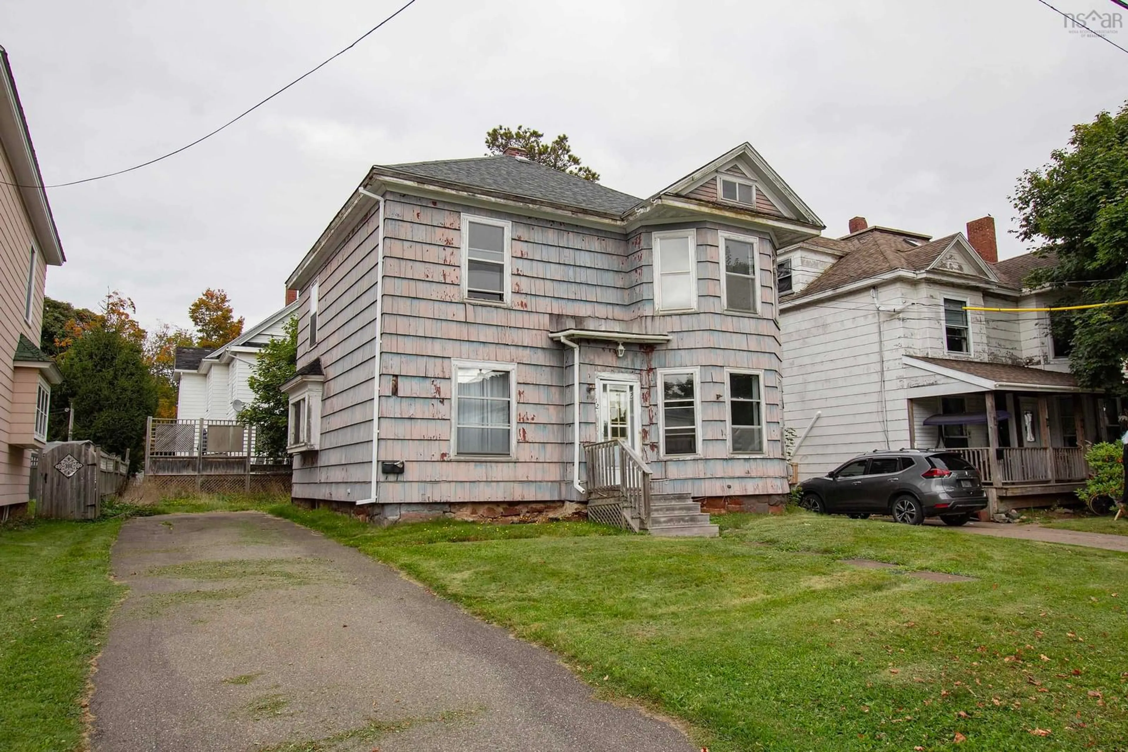 Frontside or backside of a home, the street view for 12 Clarence St, Amherst Nova Scotia B4H 3N6