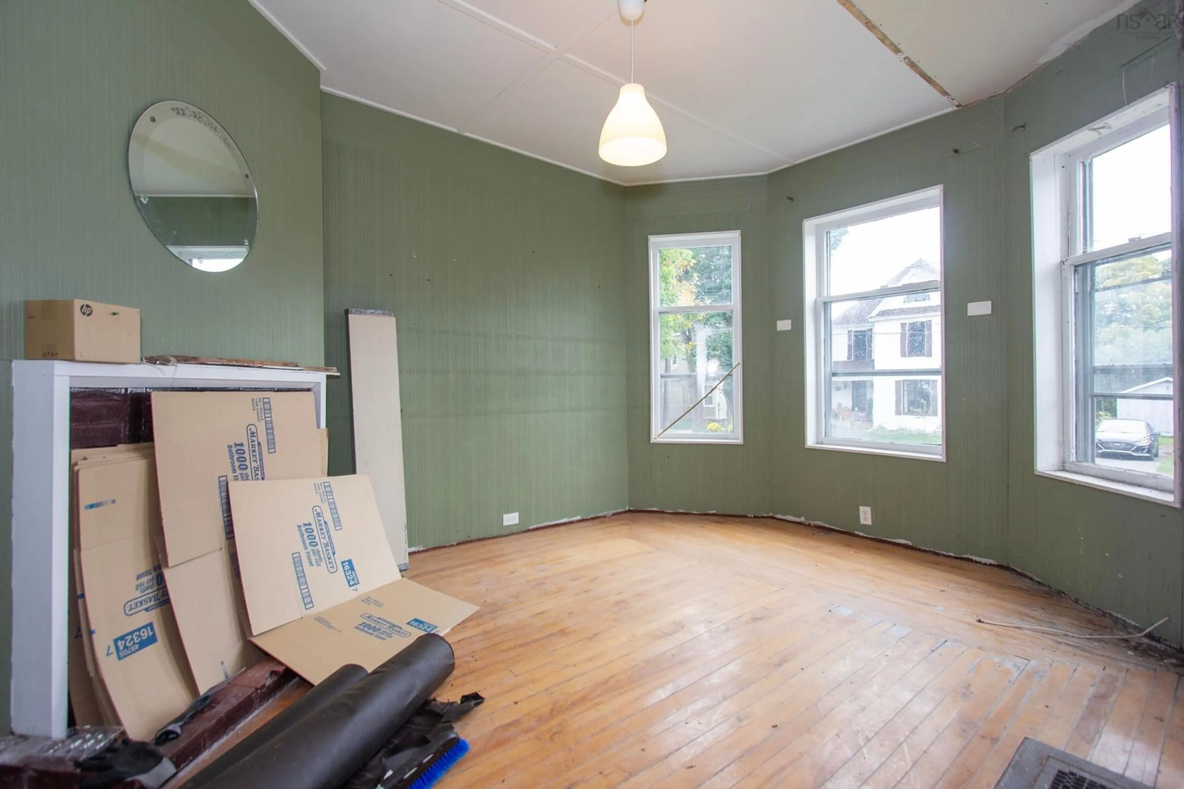 A pic of a room, wood floors for 12 Clarence St, Amherst Nova Scotia B4H 3N6